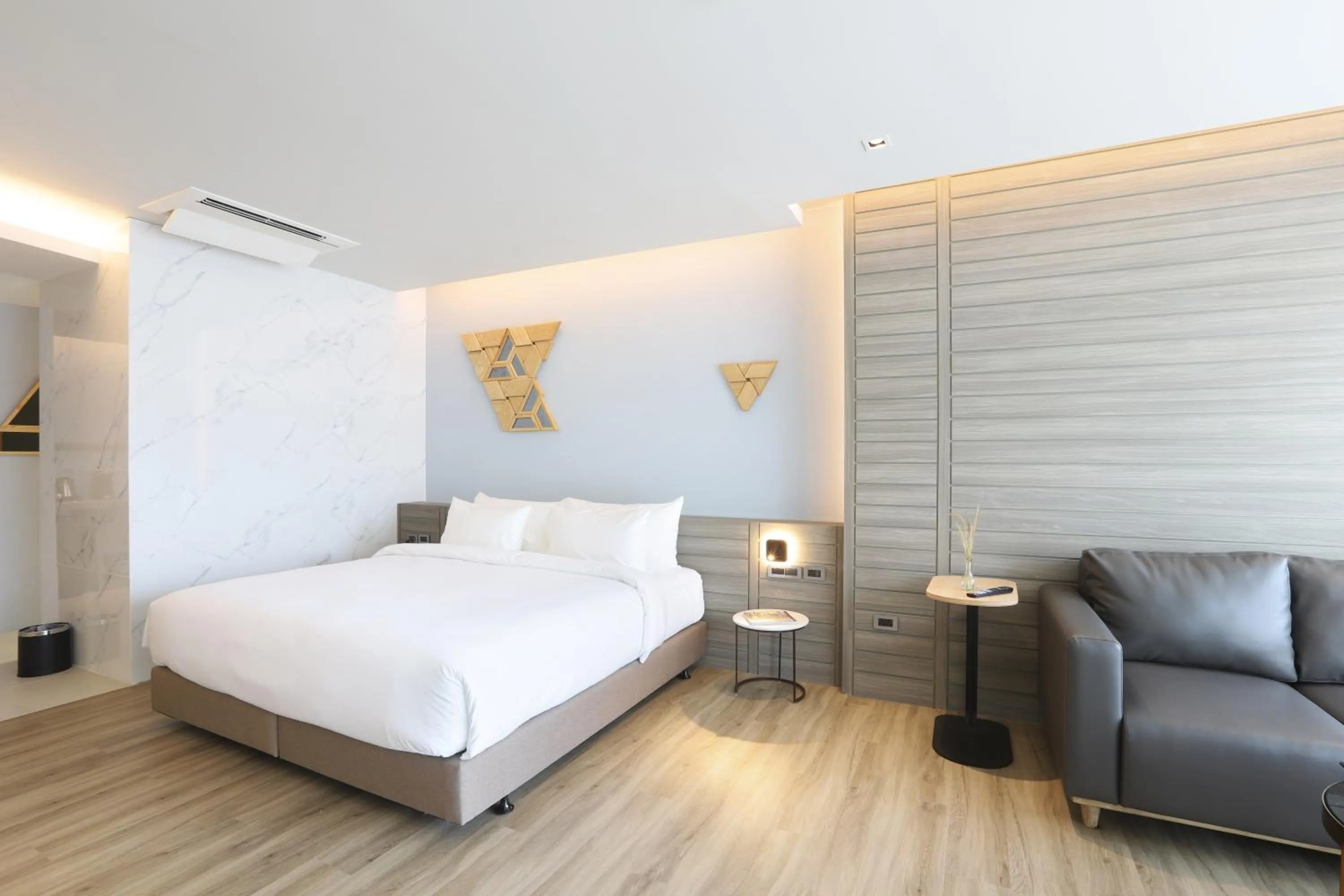 Bed in The Signature Hotel Airport