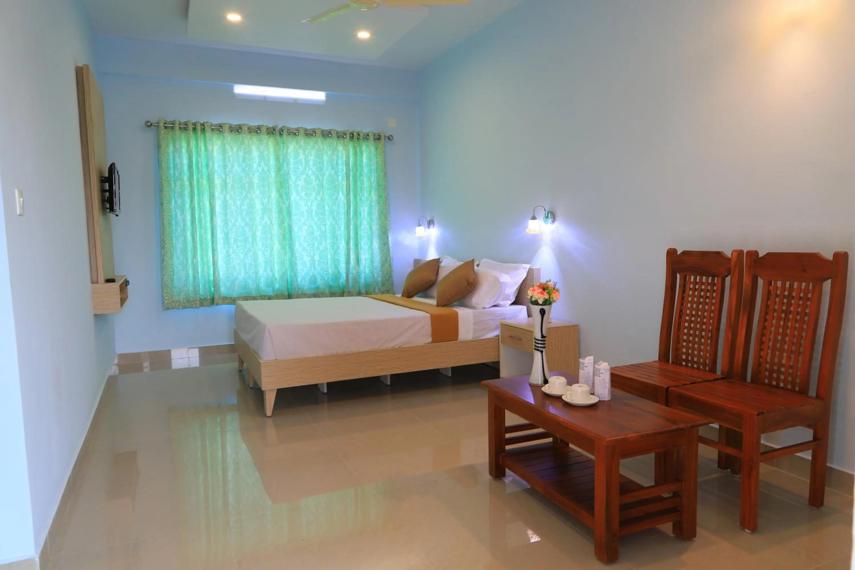 Bed in T Homes Thekkady