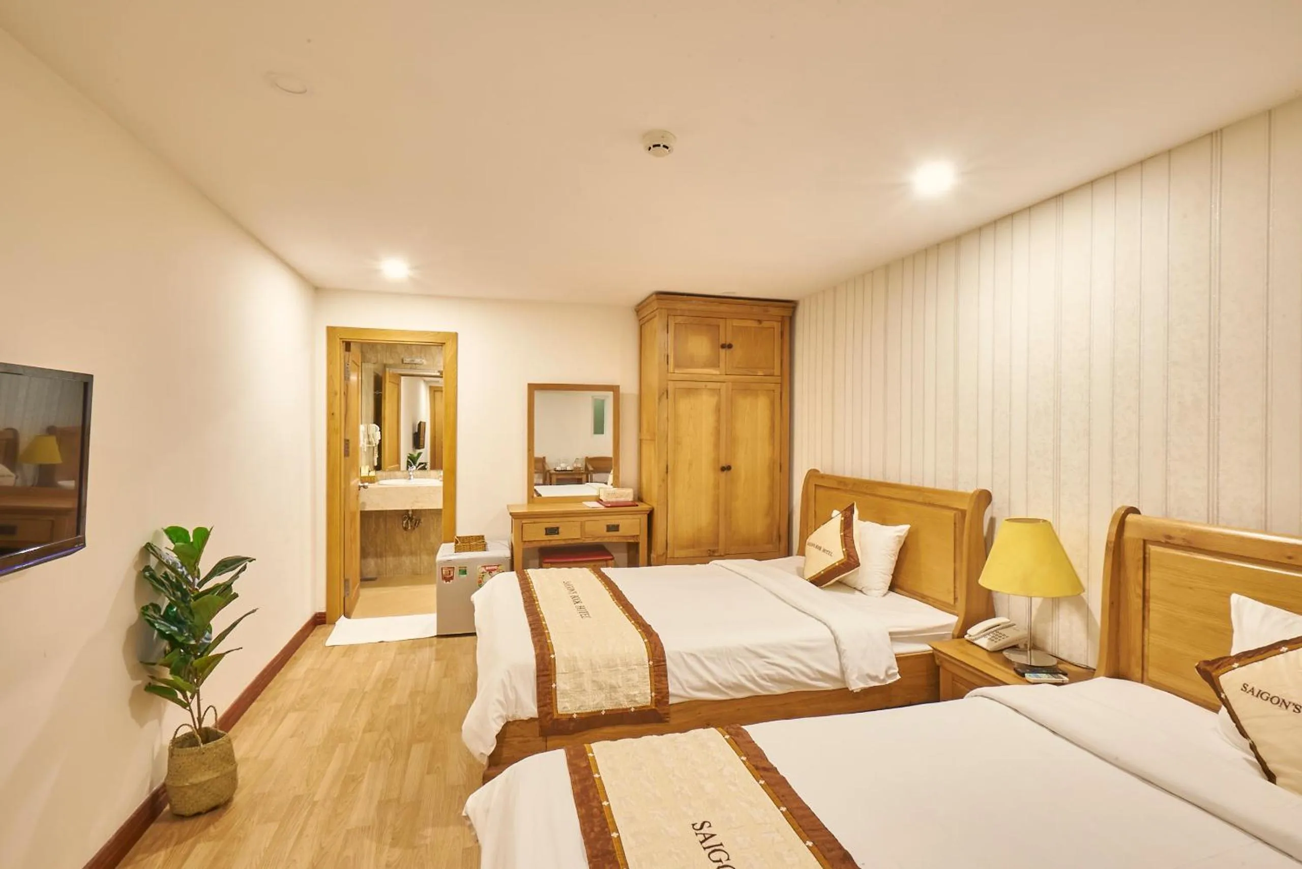 Photo of the whole room, Bed in Sai Gon's Book Hotel - The Airport Front