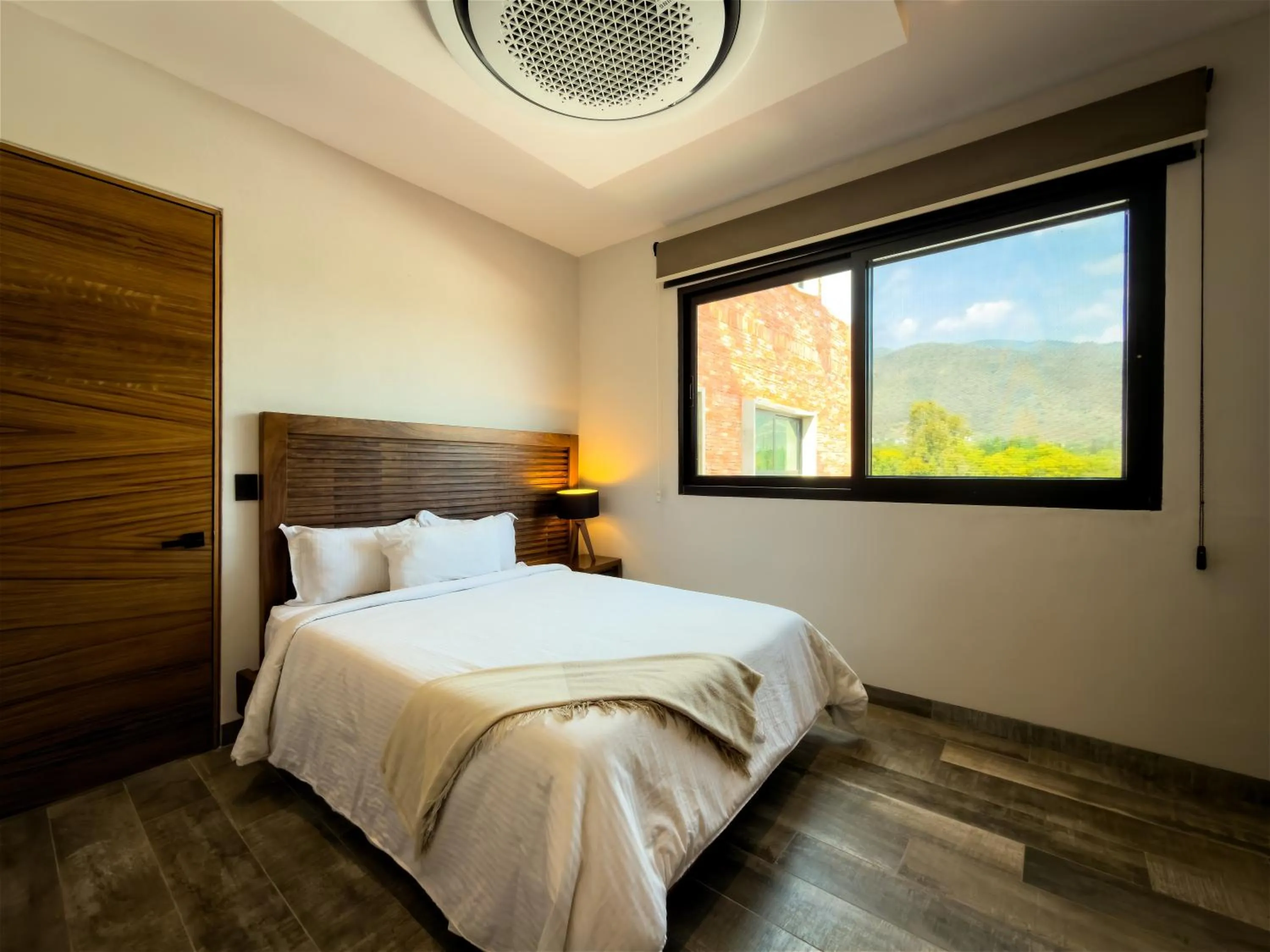 Bed in Nimue Marina Residence