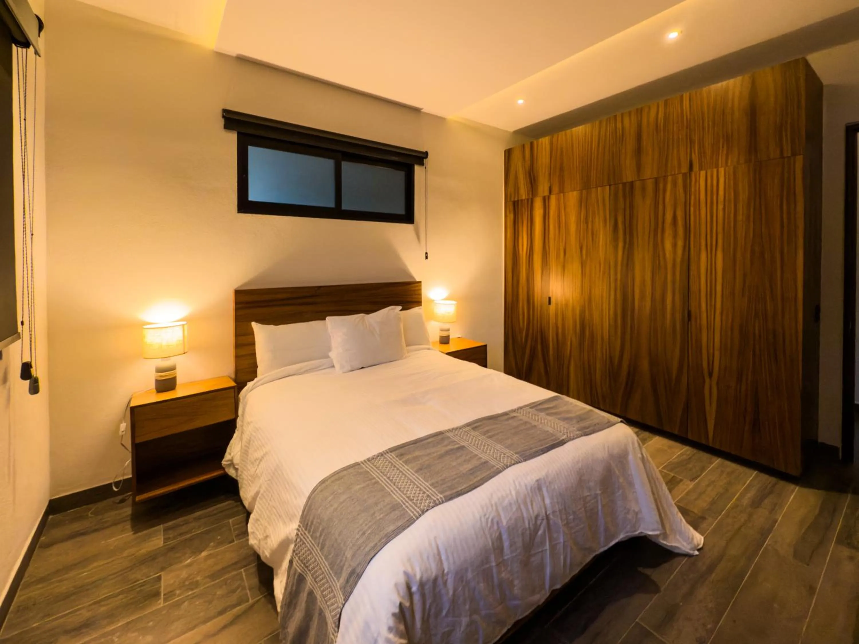 Bed in Nimue Marina Residence