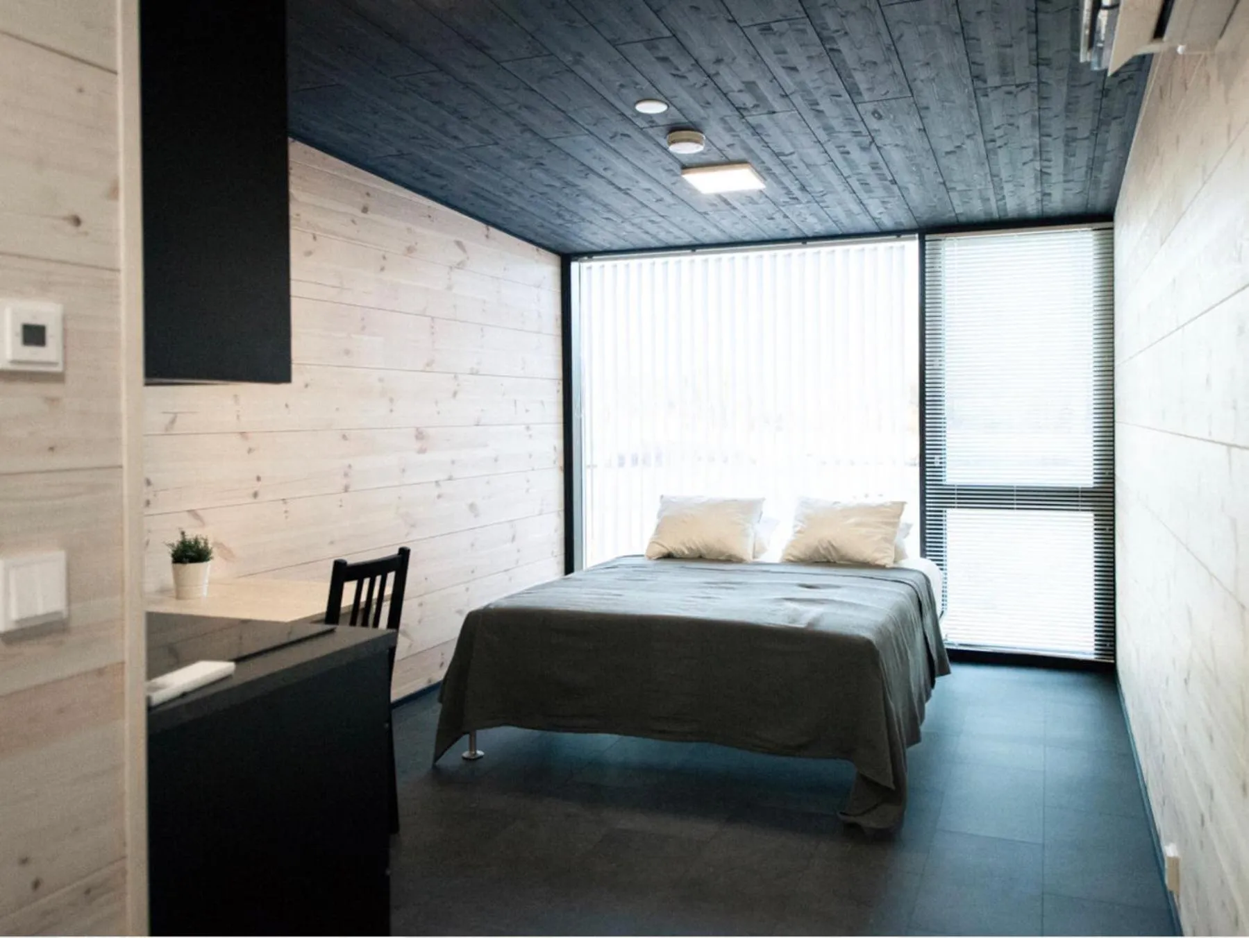 Photo of the whole room, Bed in Black Hotel