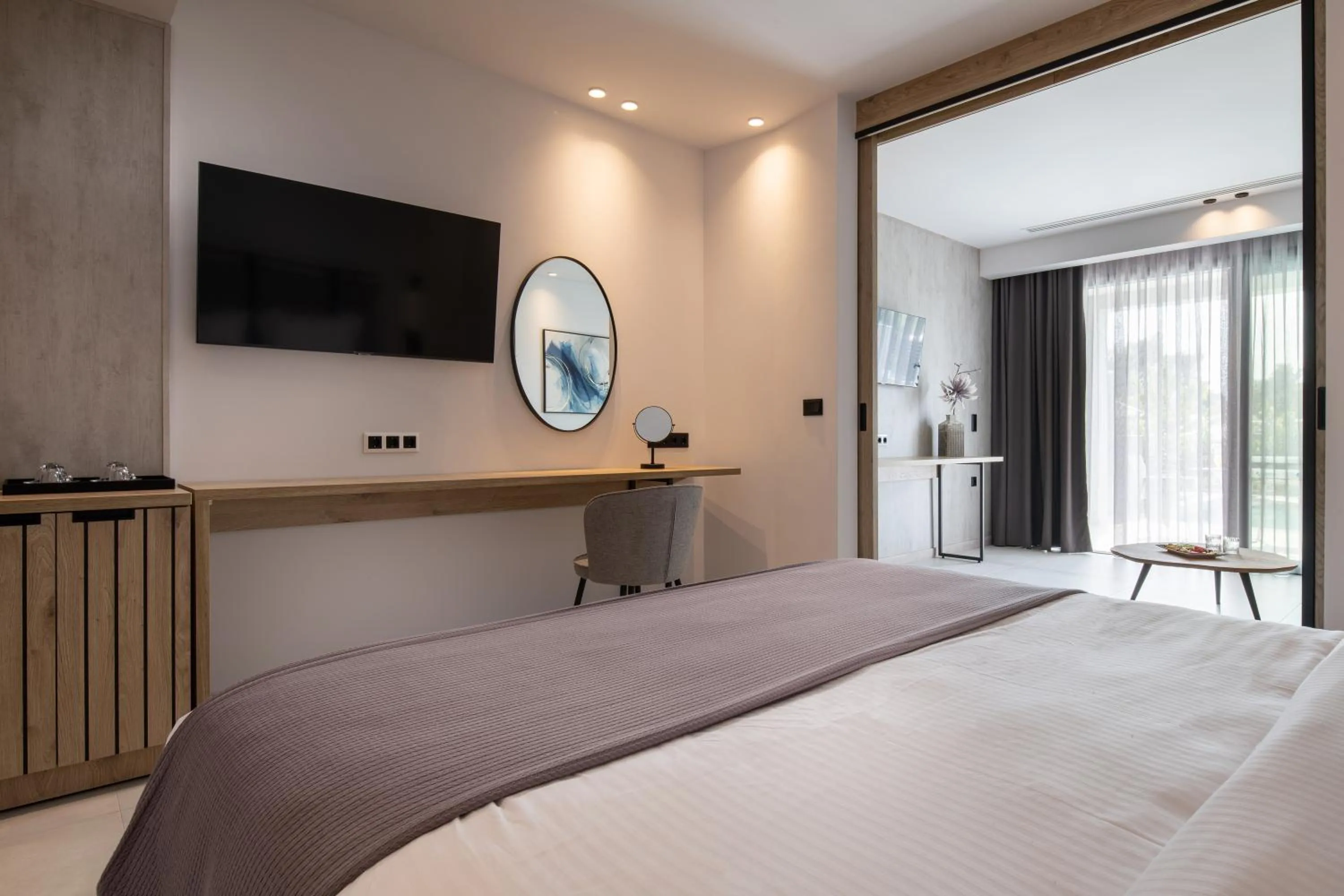 Bed in Lagomandra Luxury Suites with Private Pools