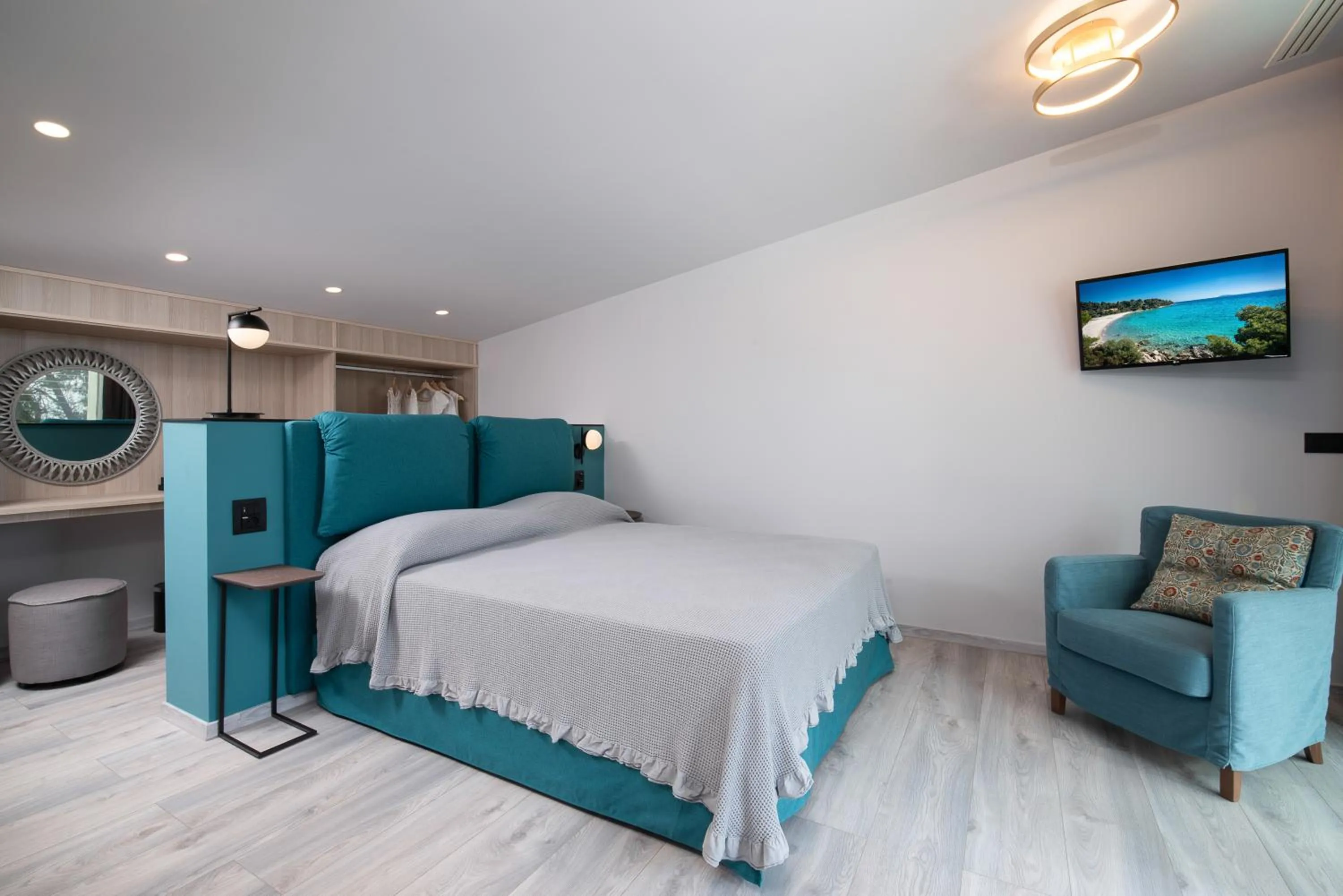 Bed in Lagomandra Luxury Suites with Private Pools