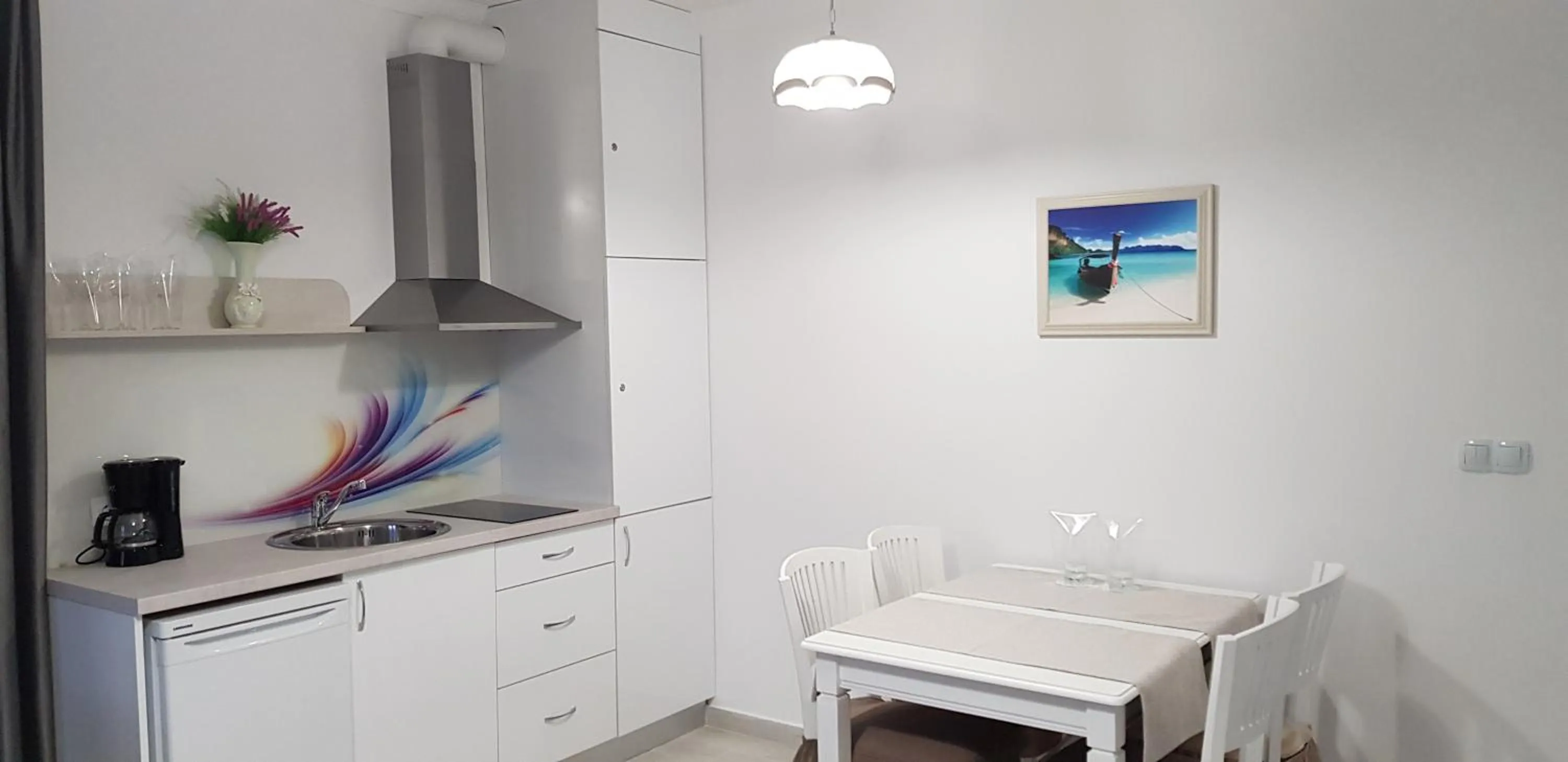 Kitchen or kitchenette in Aparthotel Olympus Plaza - SPA & Indoor Pool