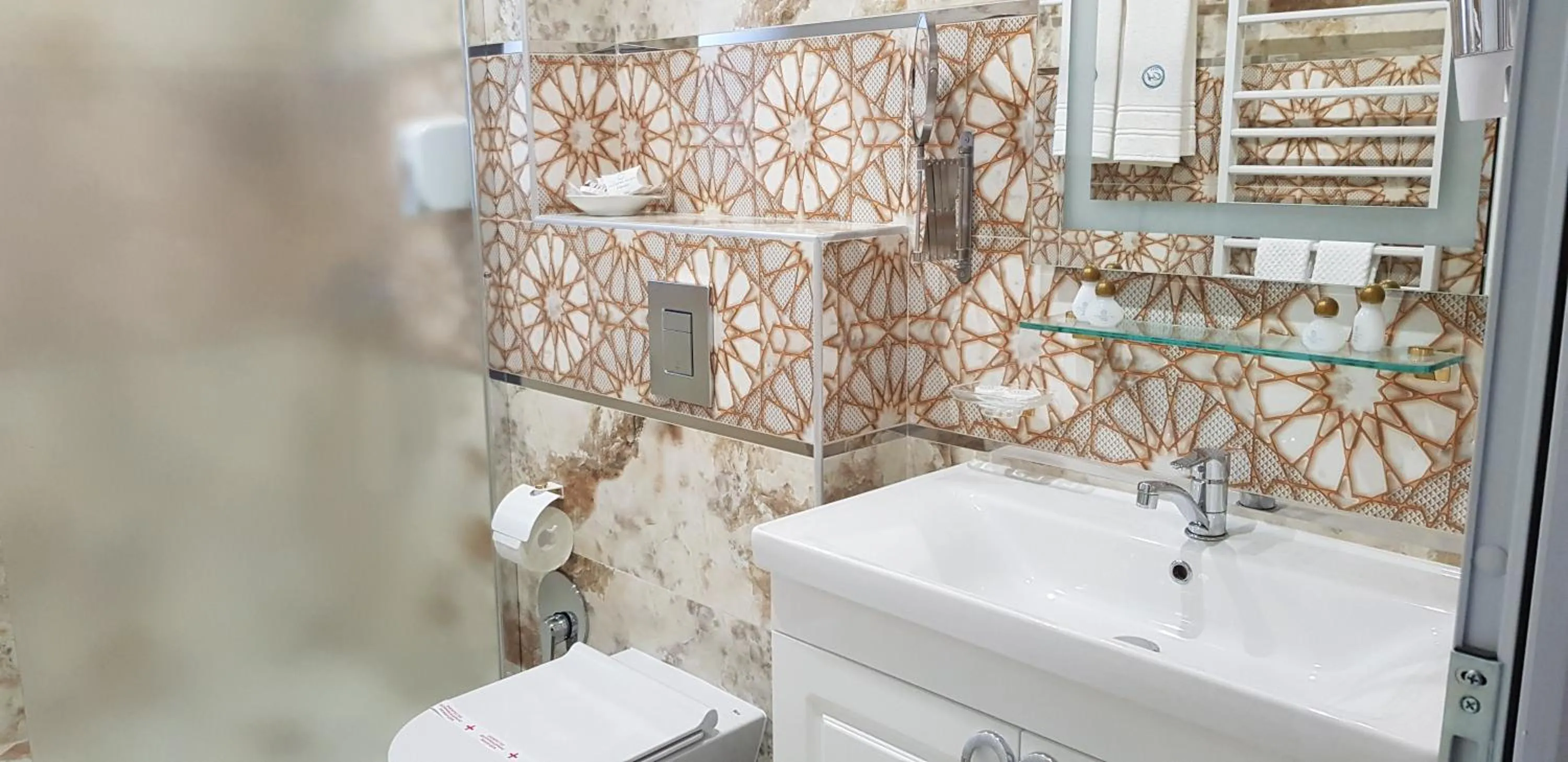 Bathroom in Aparthotel Olympus Plaza - SPA & Indoor Pool