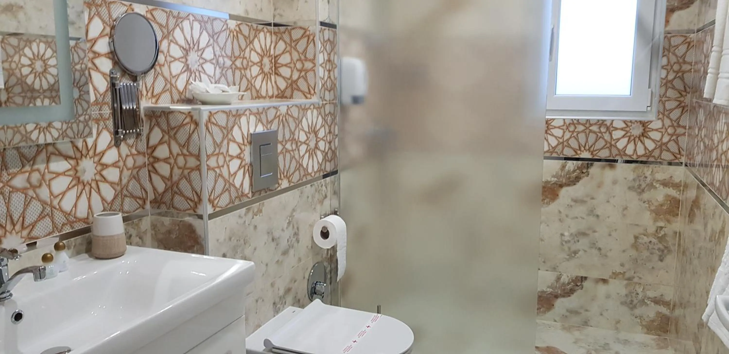 Bathroom in Aparthotel Olympus Plaza - SPA & Indoor Pool