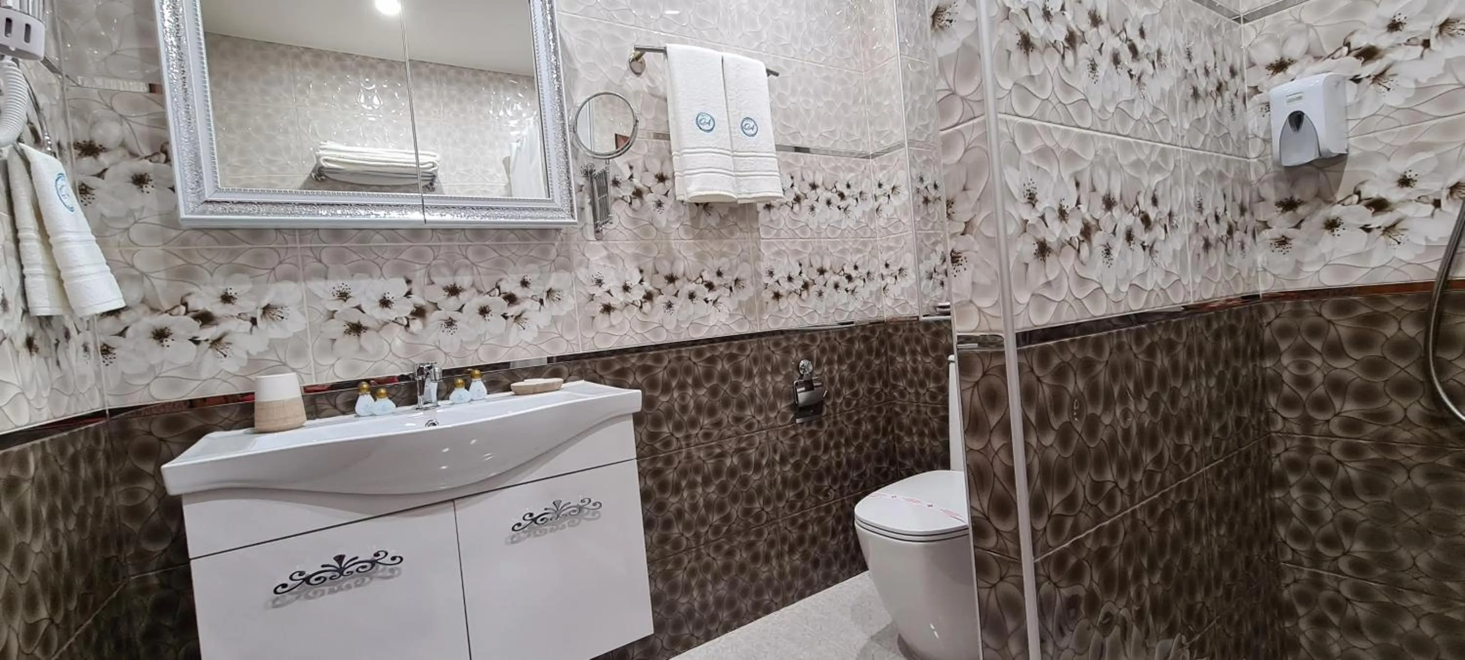 Bathroom in Aparthotel Olympus Plaza - SPA & Indoor Pool