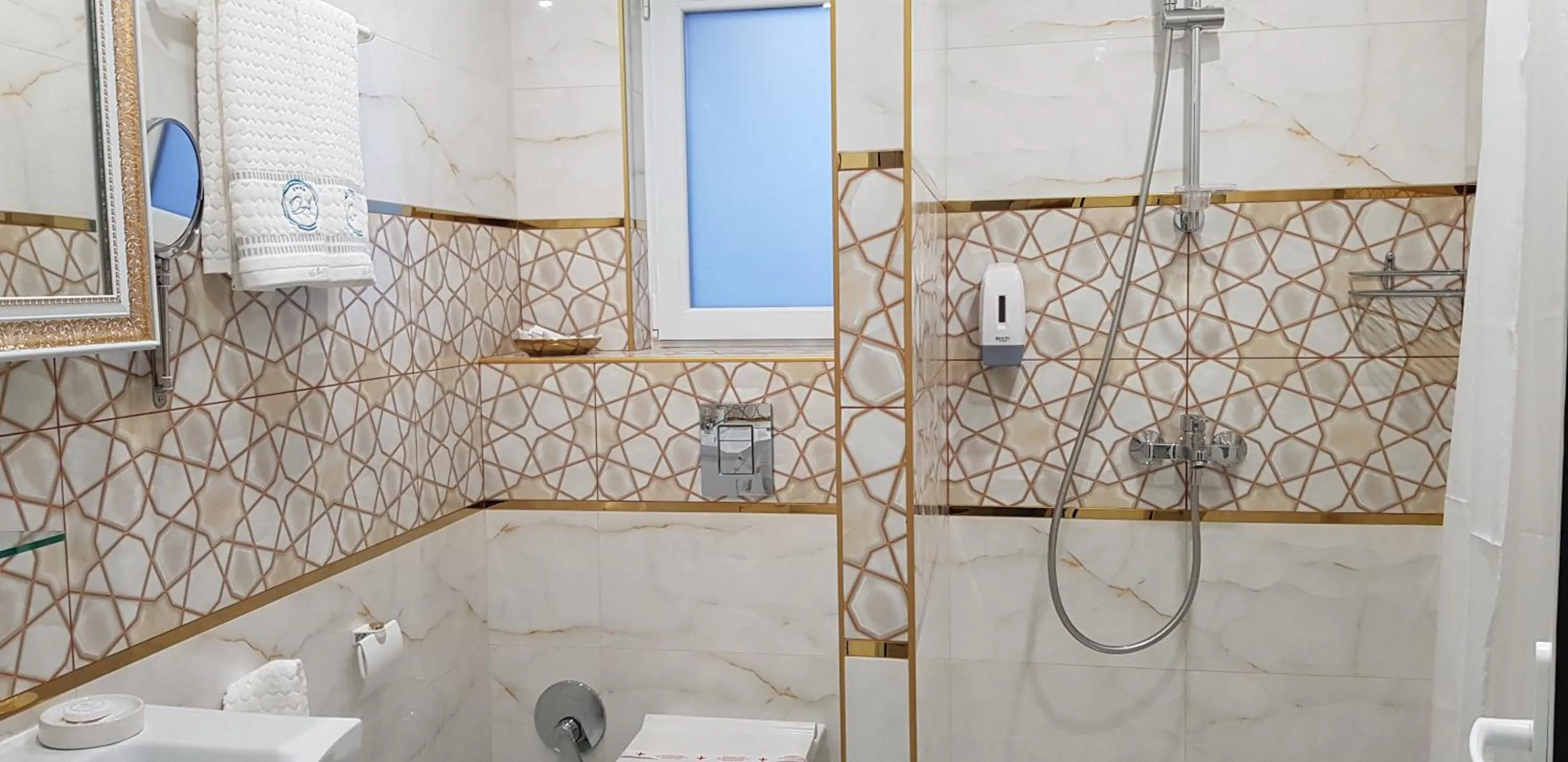 Bathroom in Aparthotel Olympus Plaza - SPA & Indoor Pool