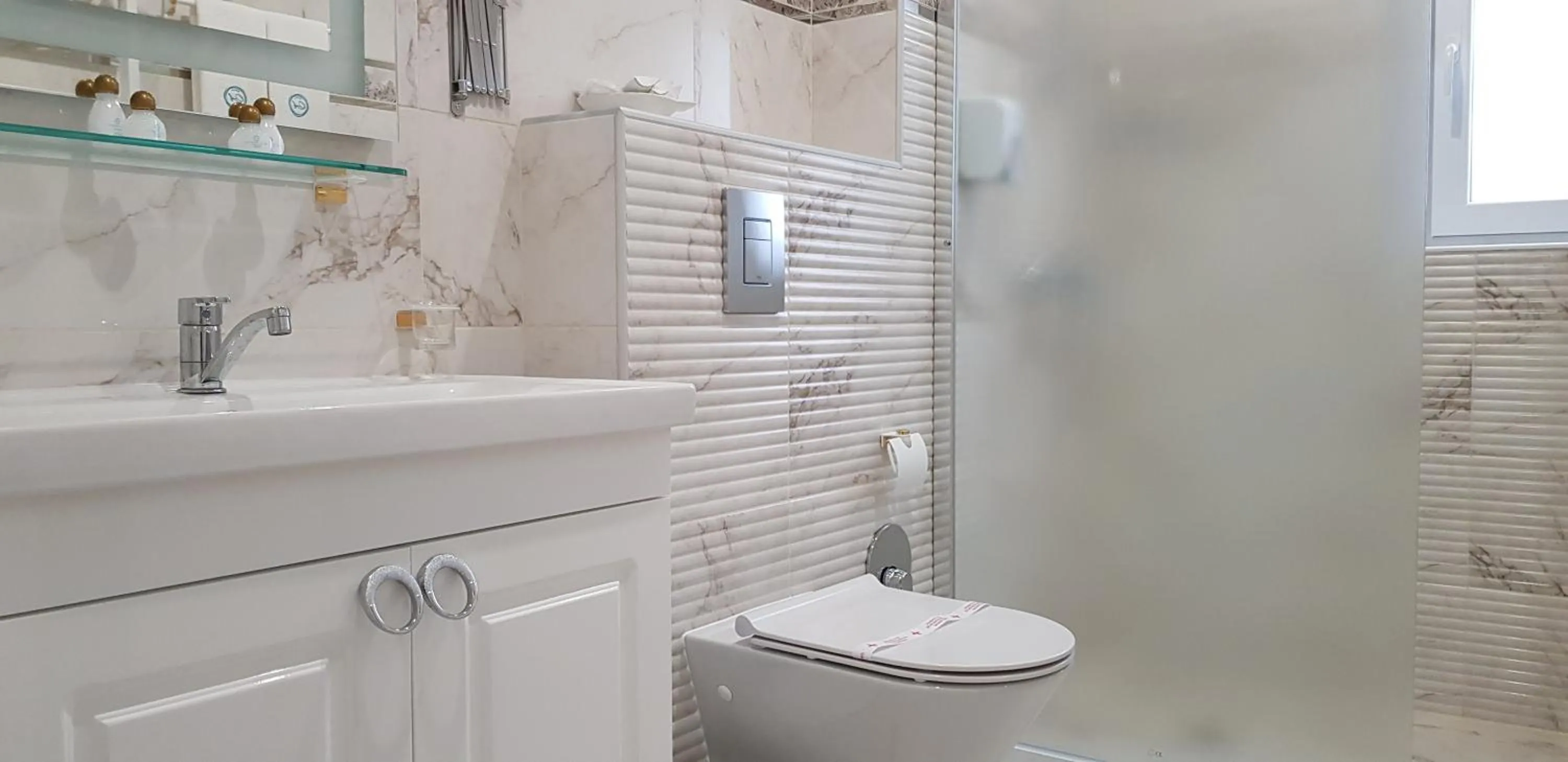 Bathroom in Aparthotel Olympus Plaza - SPA & Indoor Pool