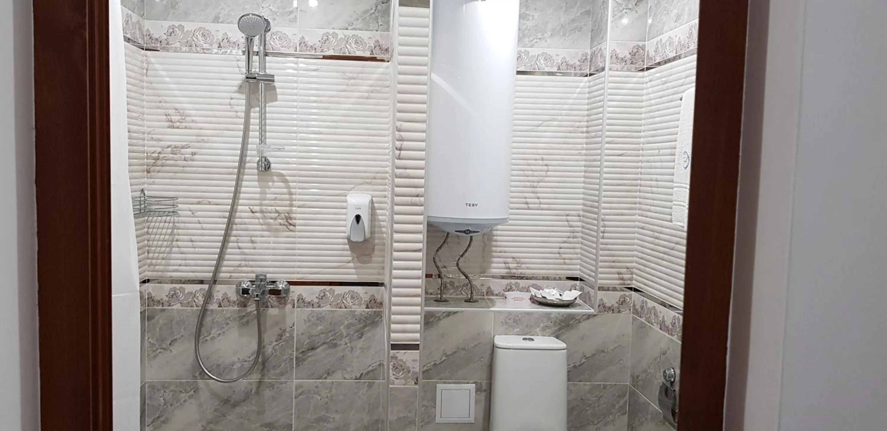 Bathroom in Aparthotel Olympus Plaza - SPA & Indoor Pool