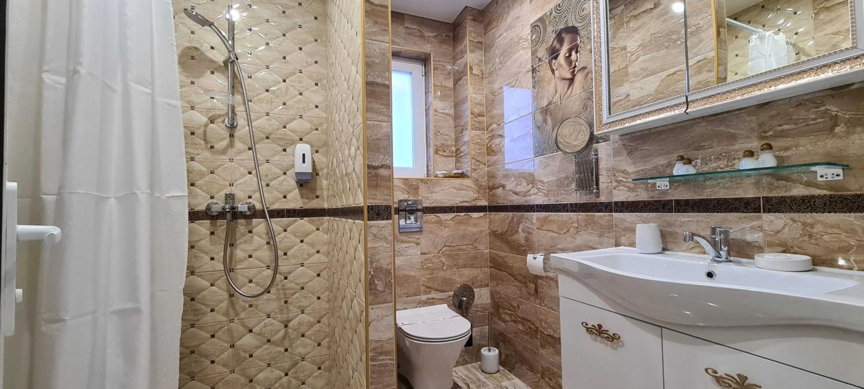 Bathroom in Aparthotel Olympus Plaza - SPA & Indoor Pool