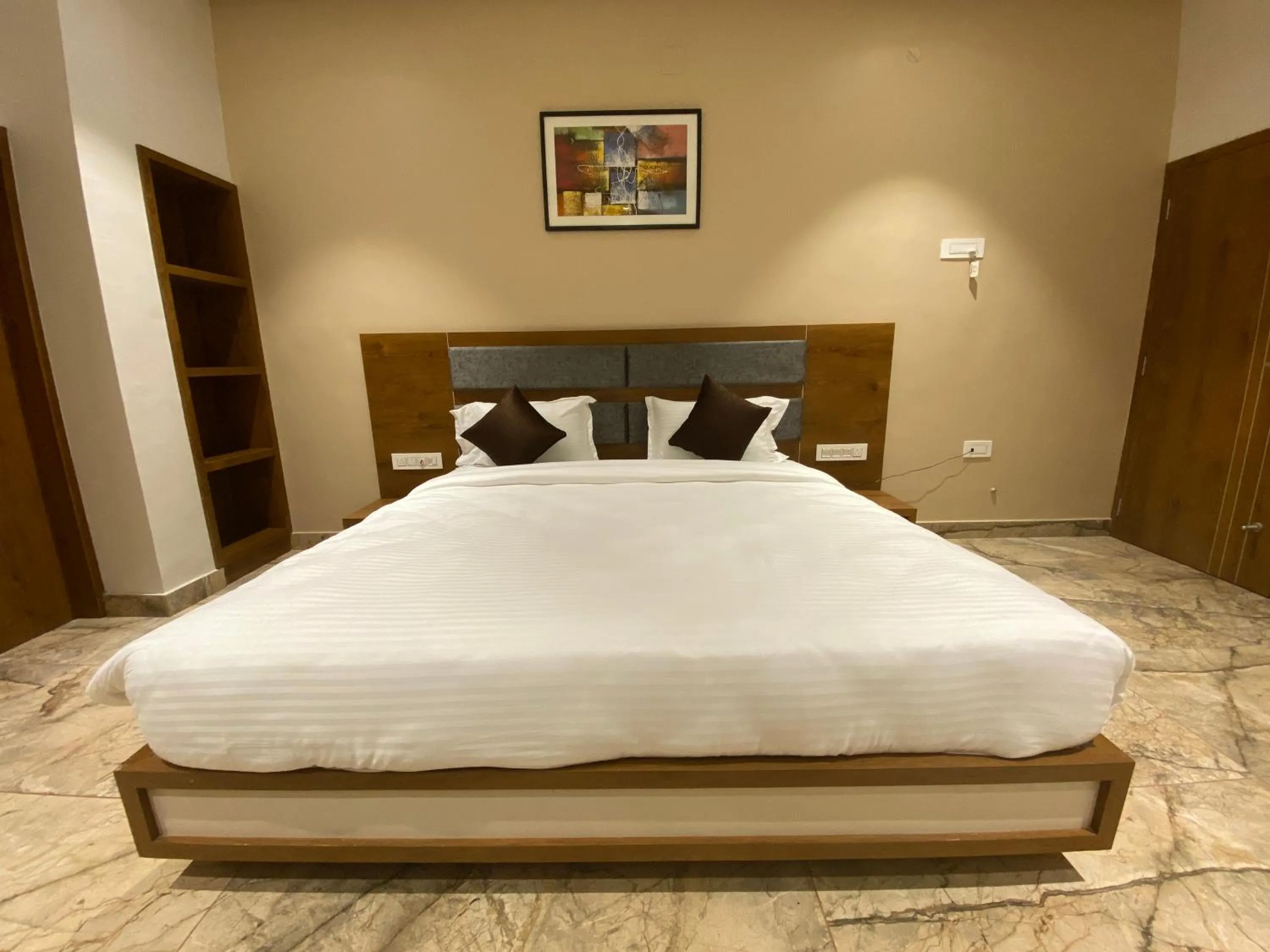 Bed in HOTEL DAMODAR