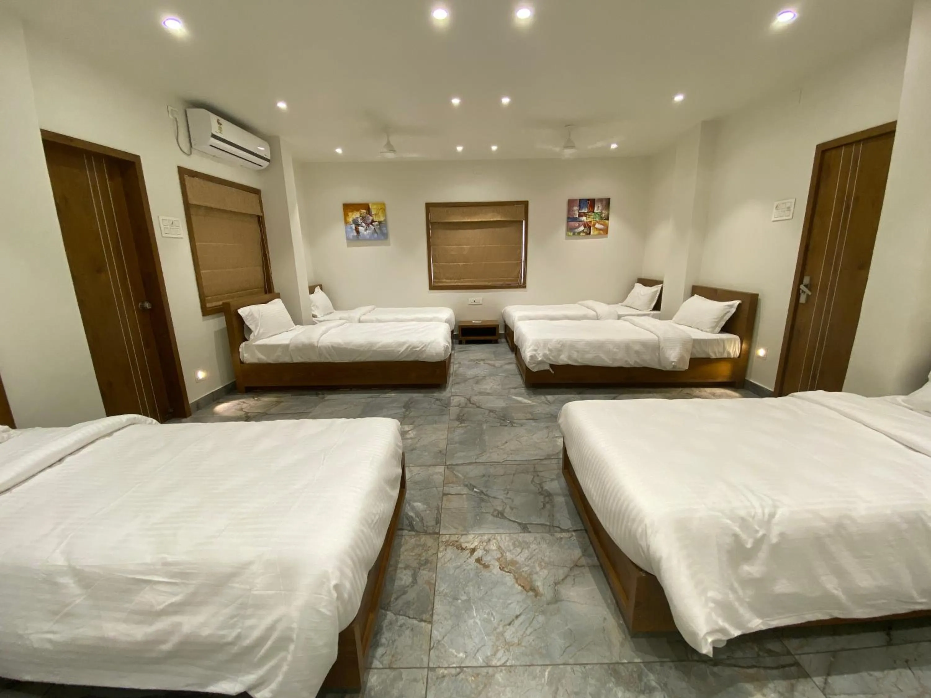 Bed in HOTEL DAMODAR