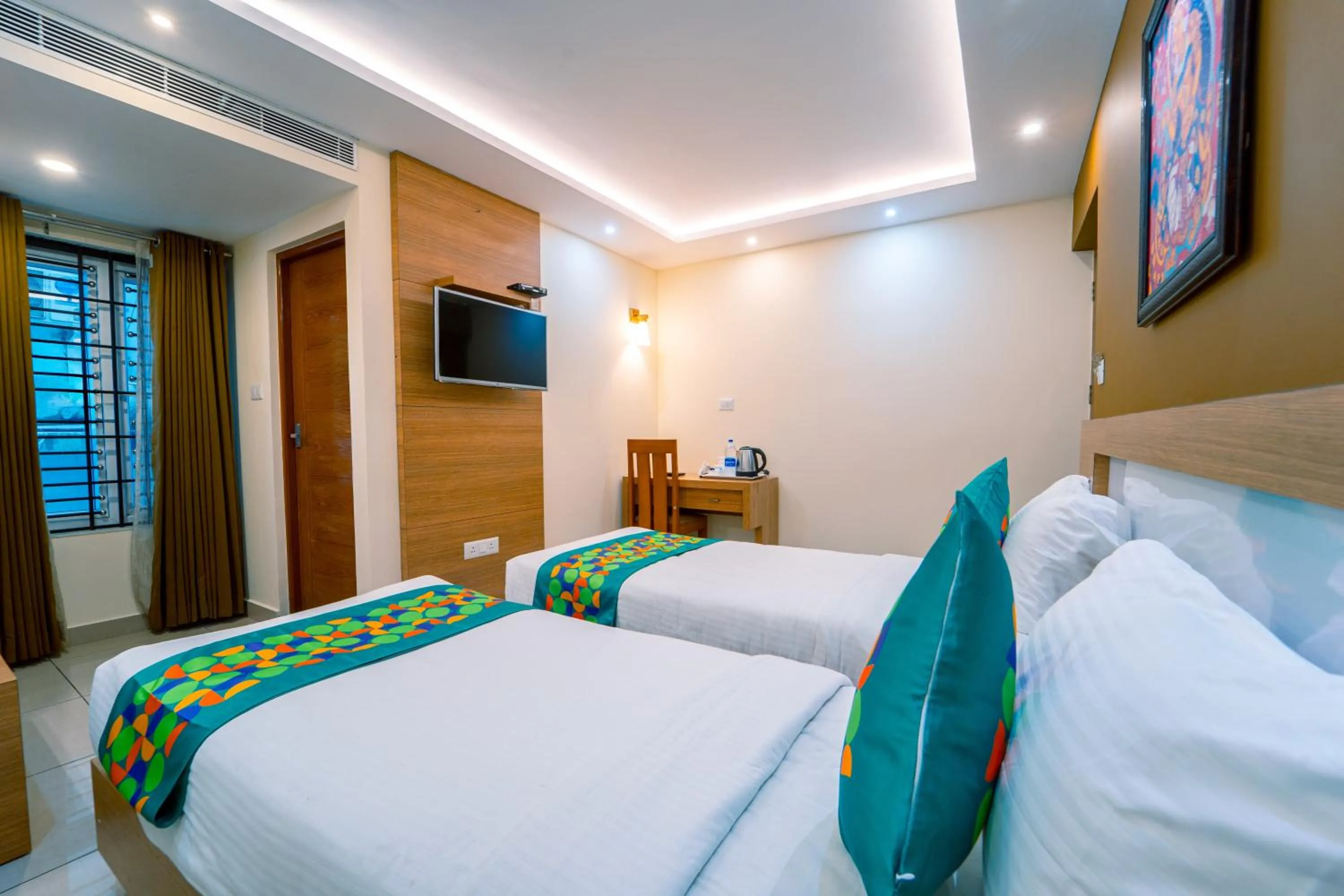 Bedroom, Bed in Treebo Sree Varshavilas Regency, 2 Mins From Guruvayoor Temple