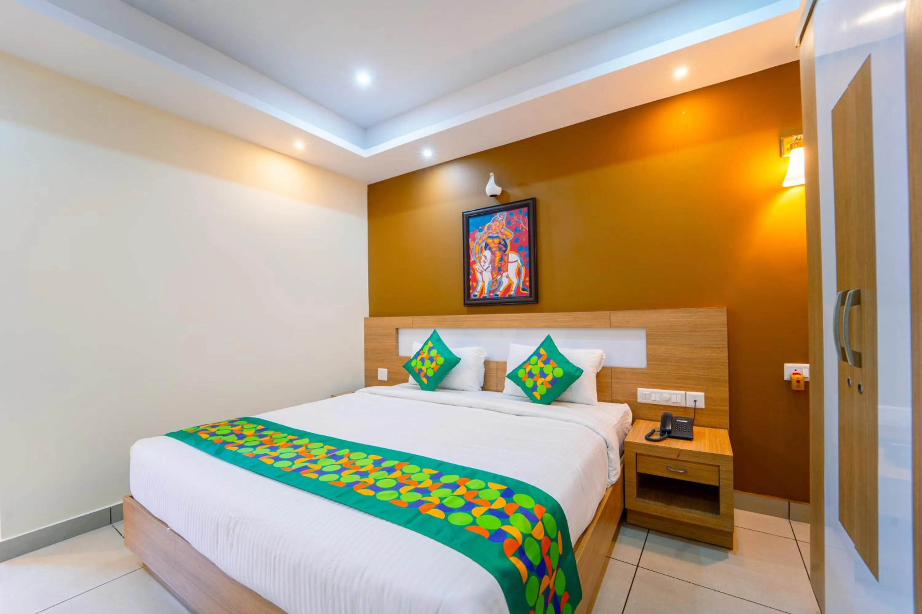 Bedroom, Bed in Treebo Sree Varshavilas Regency, 2 Mins From Guruvayoor Temple