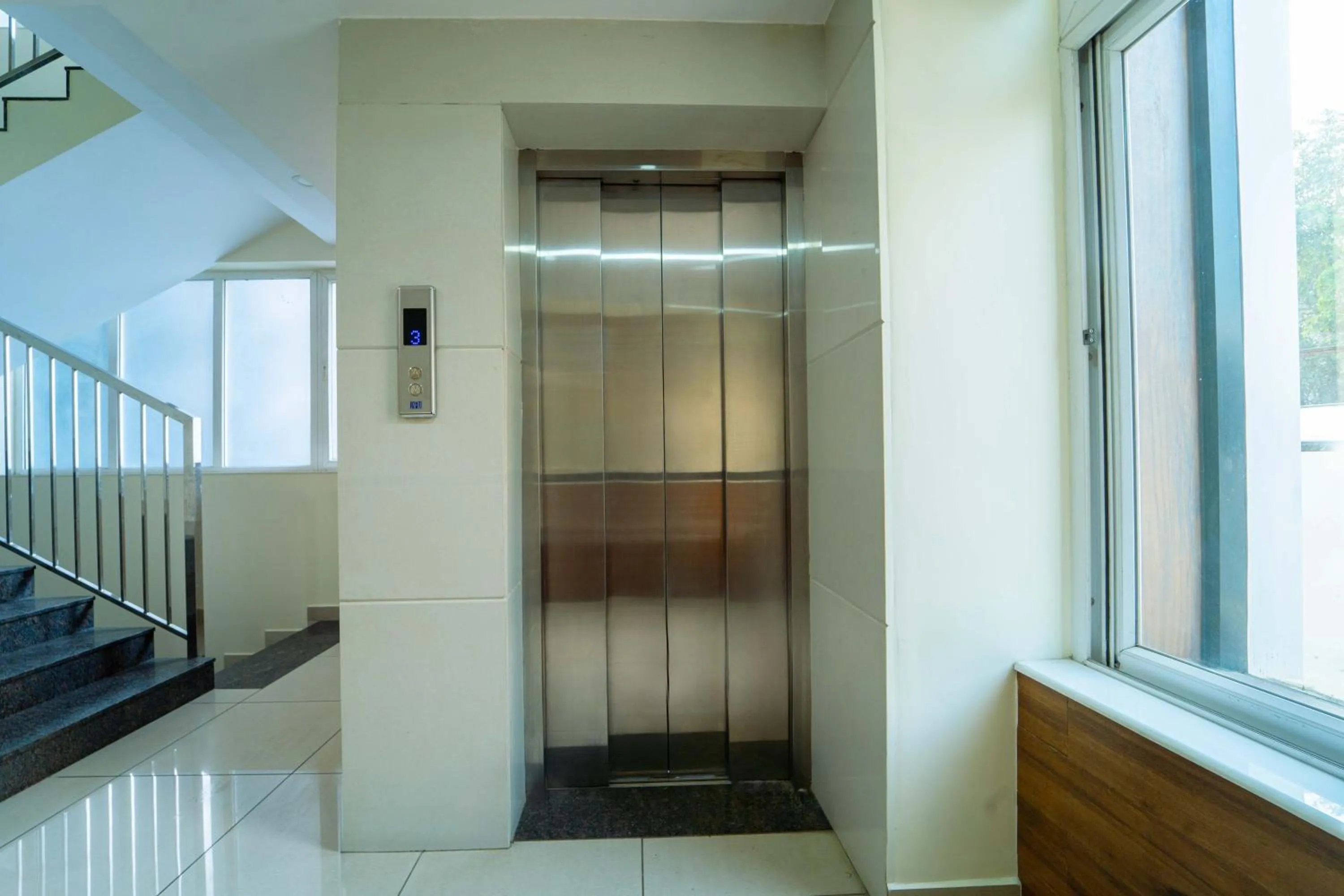 elevator in Treebo Sree Varshavilas Regency, 2 Mins From Guruvayoor Temple