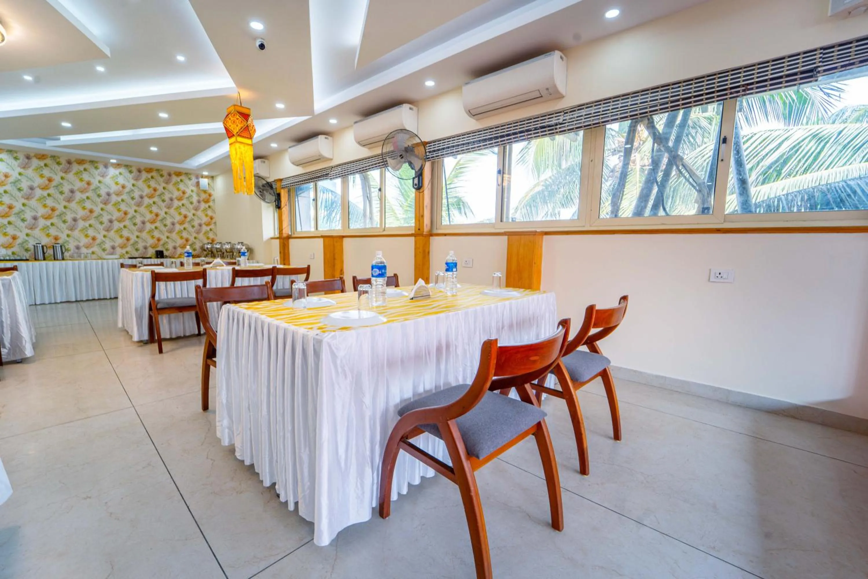Dining area in Treebo Sree Varshavilas Regency, 2 Mins From Guruvayoor Temple