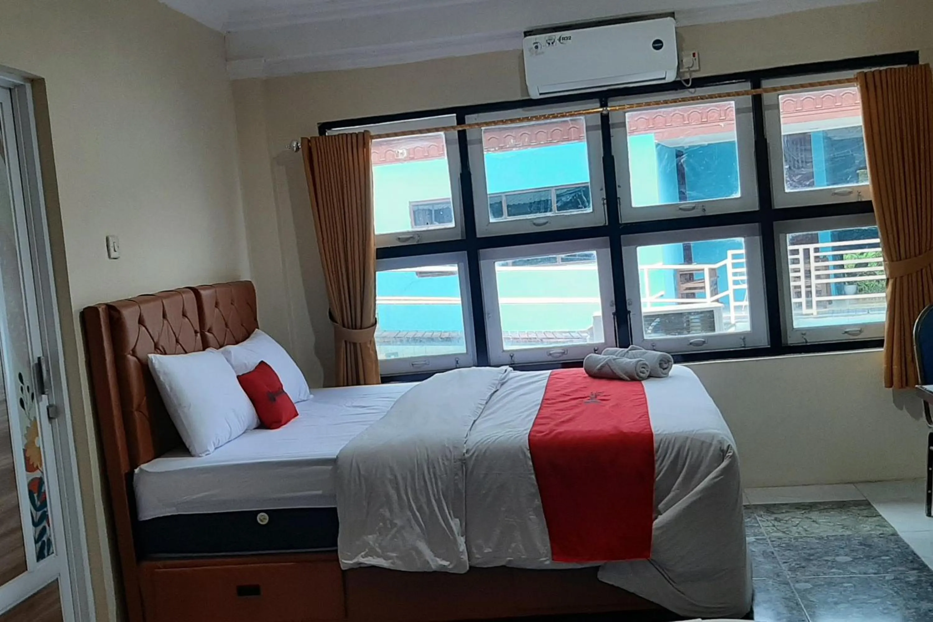 Bed in RedDoorz At Hotel Pakem Sari Kaliurang