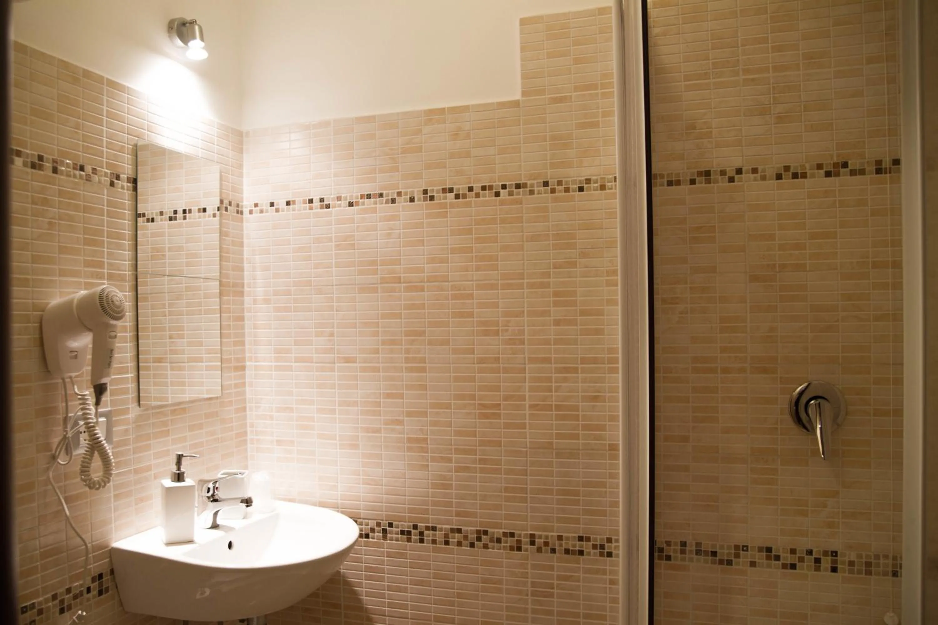 Bathroom in Mosaic Central Guest House