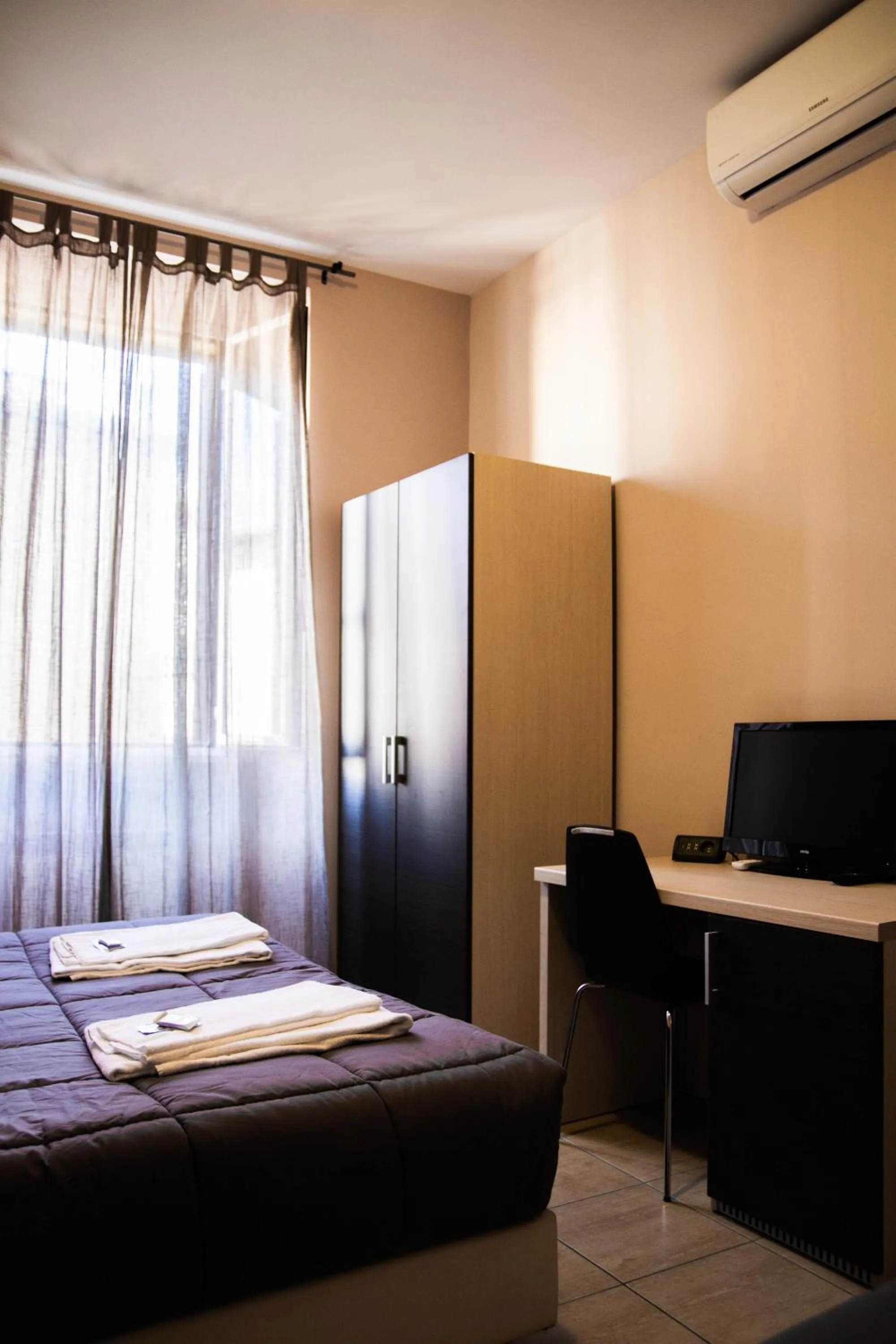 Bedroom, Bed in Mosaic Central Guest House