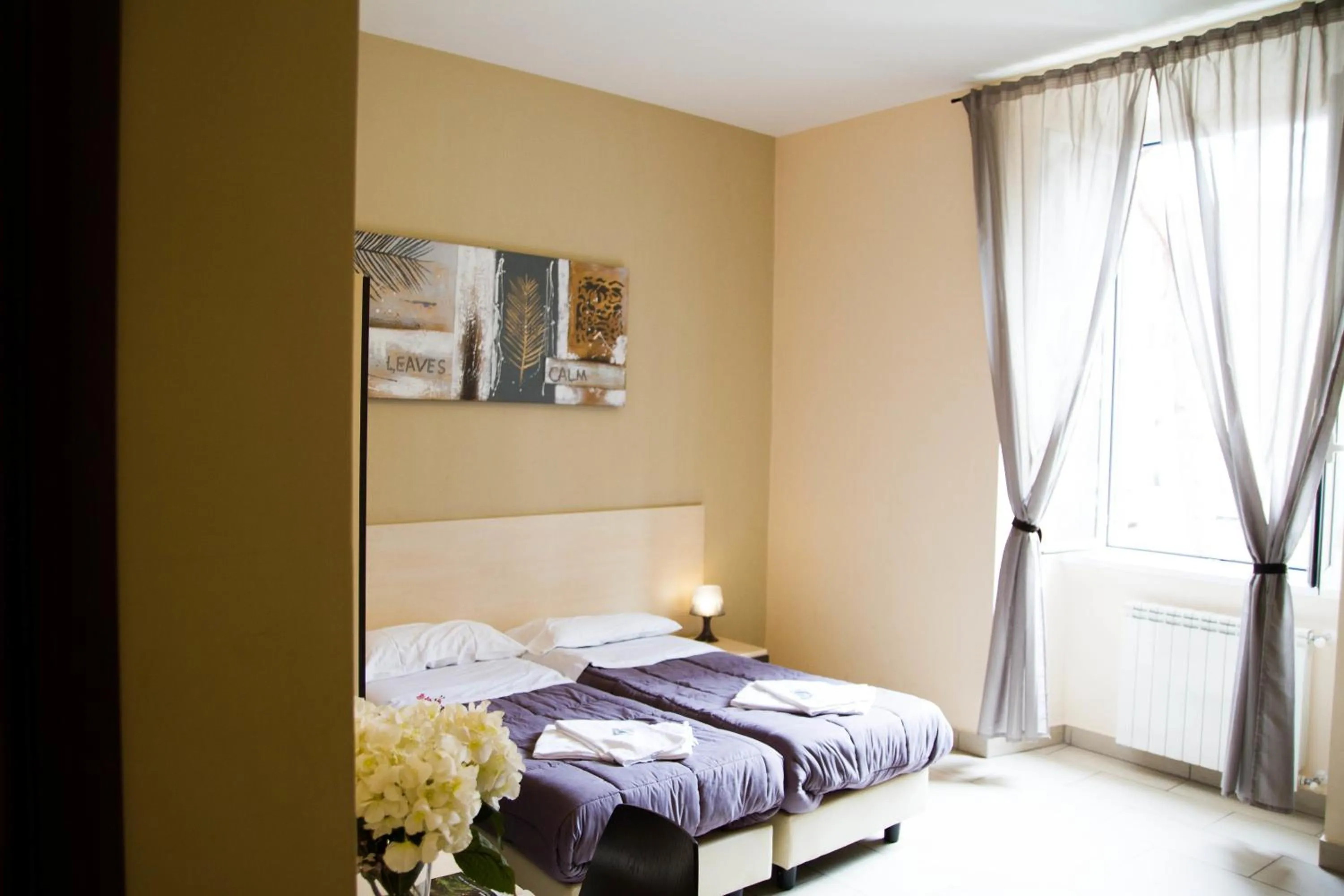 Bedroom, Bed in Mosaic Central Guest House