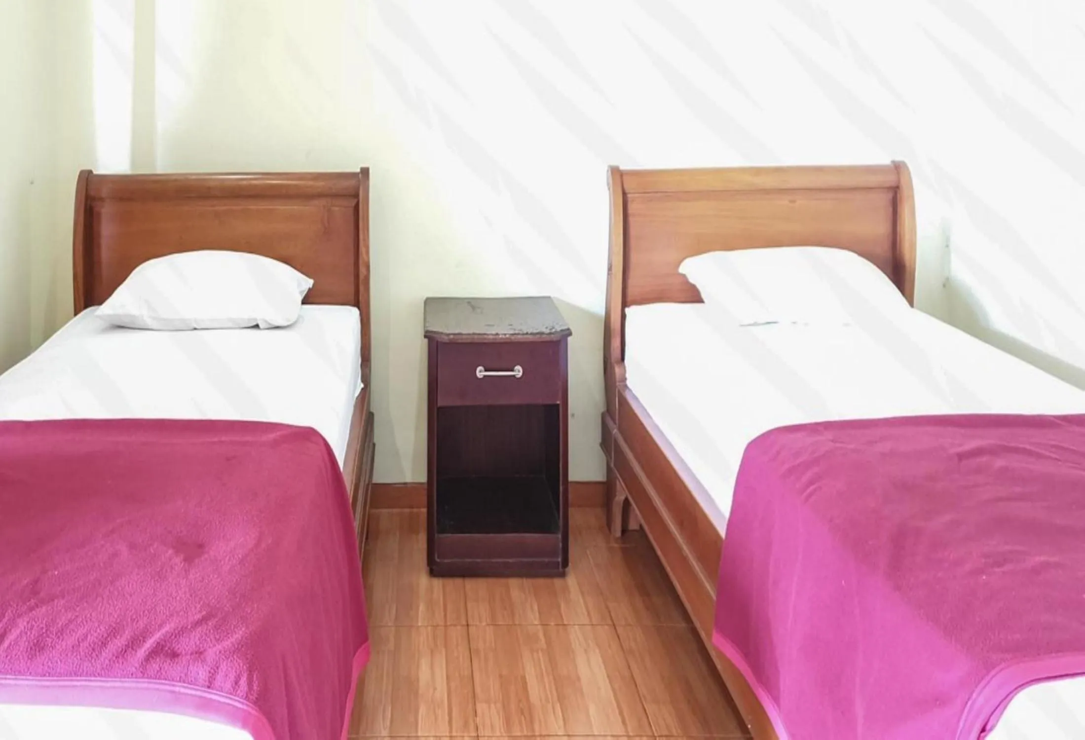 Bed in Hotel Mataram Cipanas Syariah Mitra RedDoorz