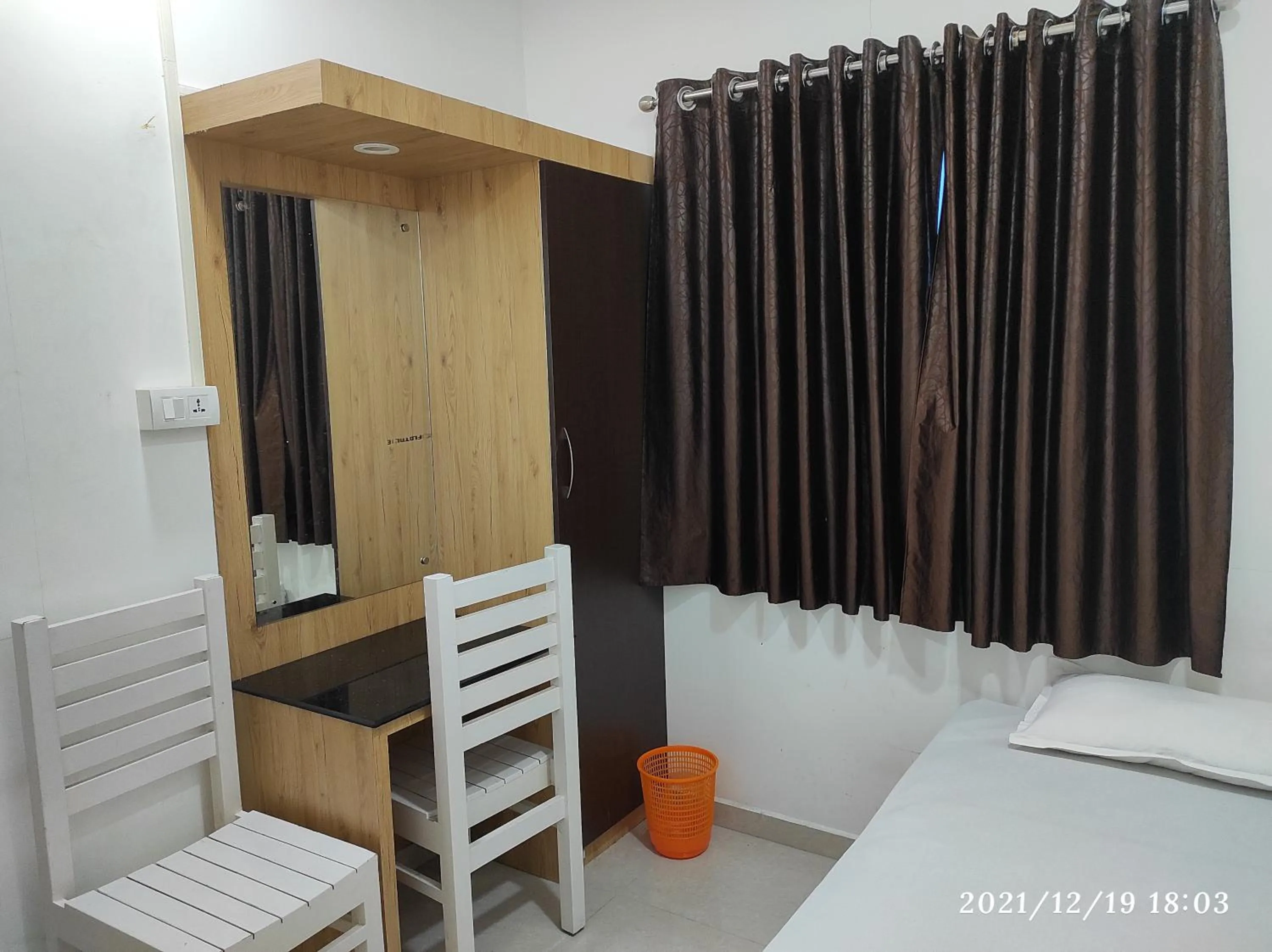 Bed in Quilon Residency