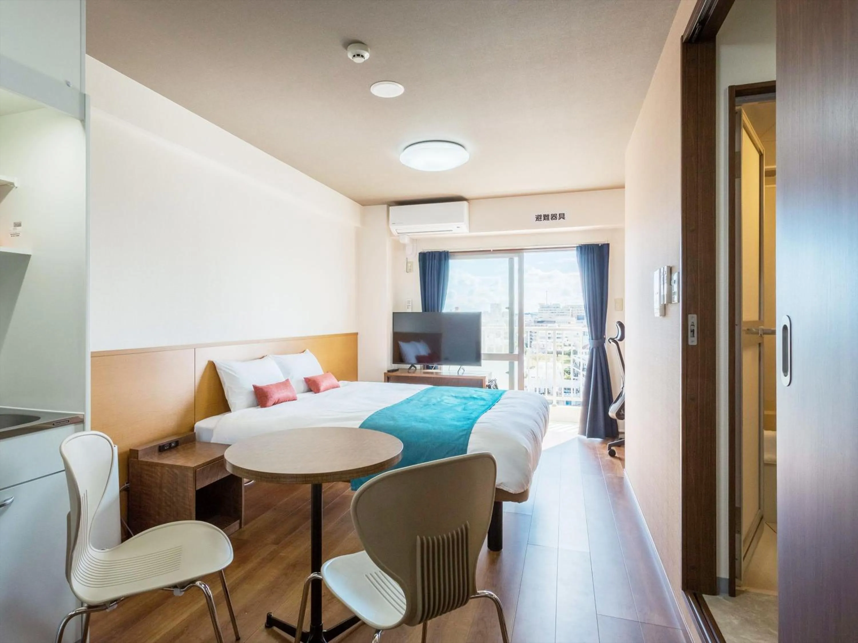 Living room, Bed in Ryujin Hotel Ukishima