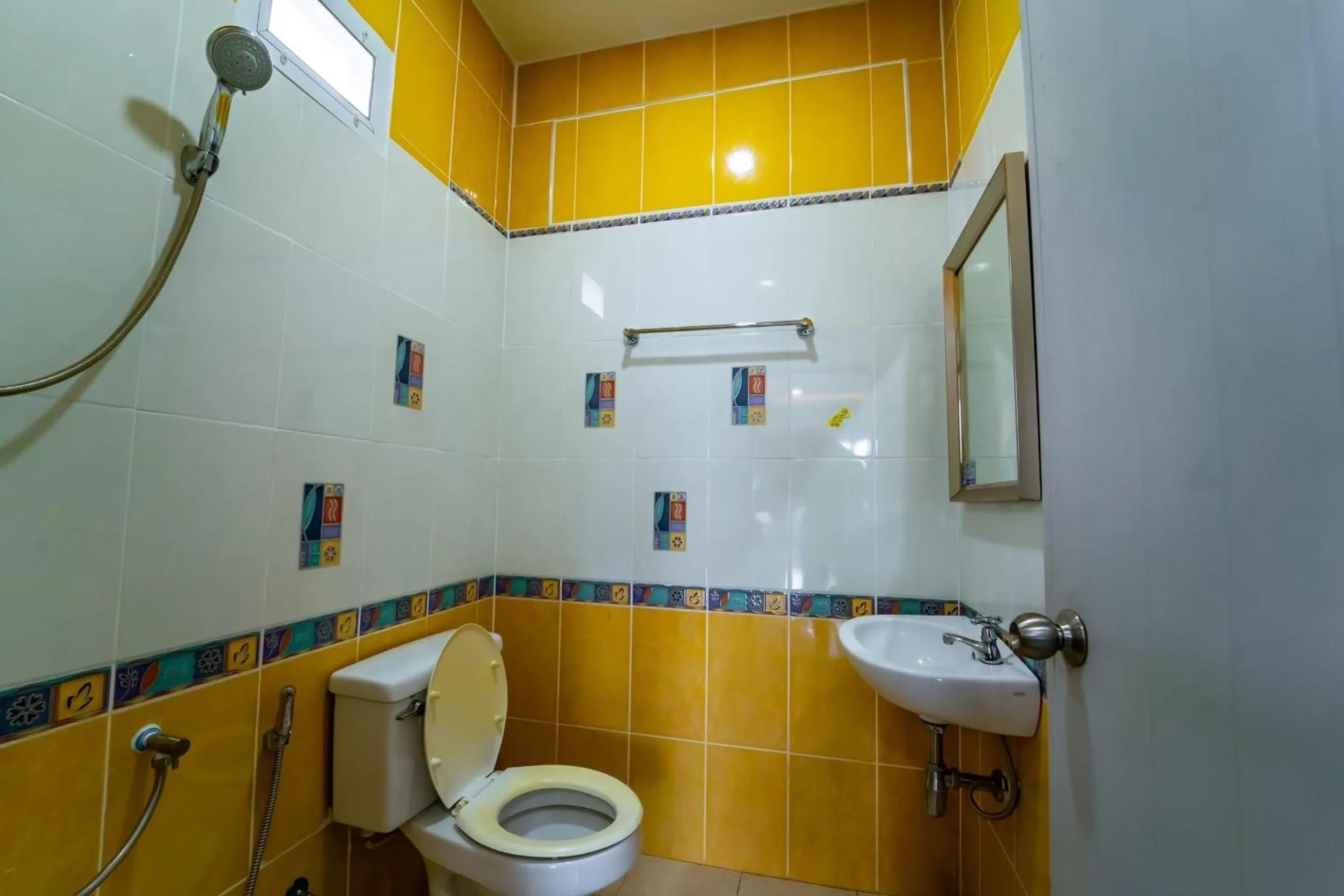 Bathroom in OYO 75377 Check In House