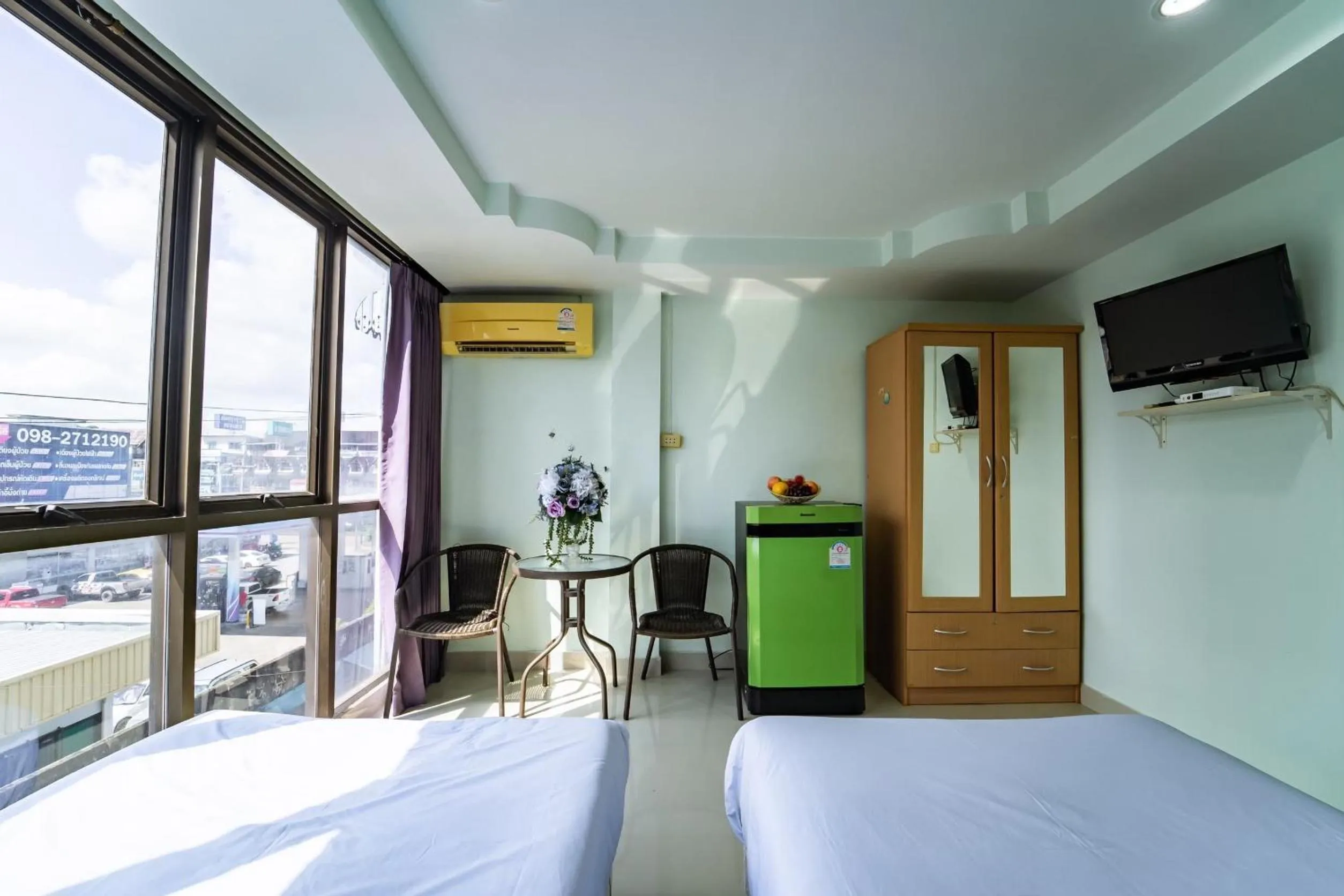 Bedroom in OYO 75377 Check In House