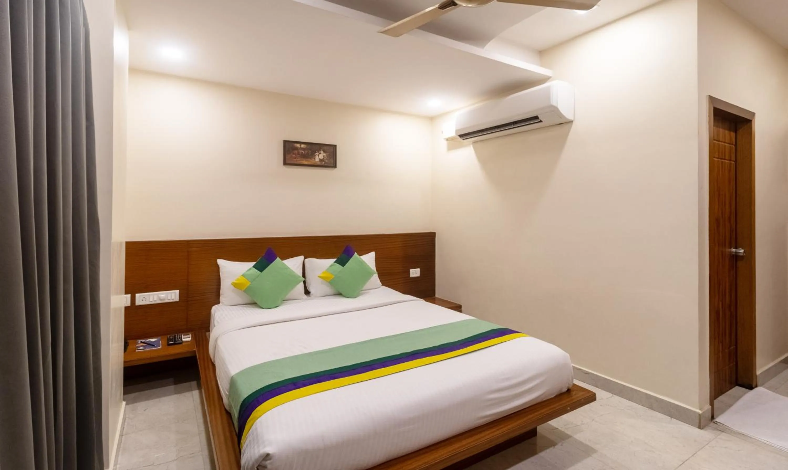 Bedroom, Bed in Treebo Anjani Fortune Suites