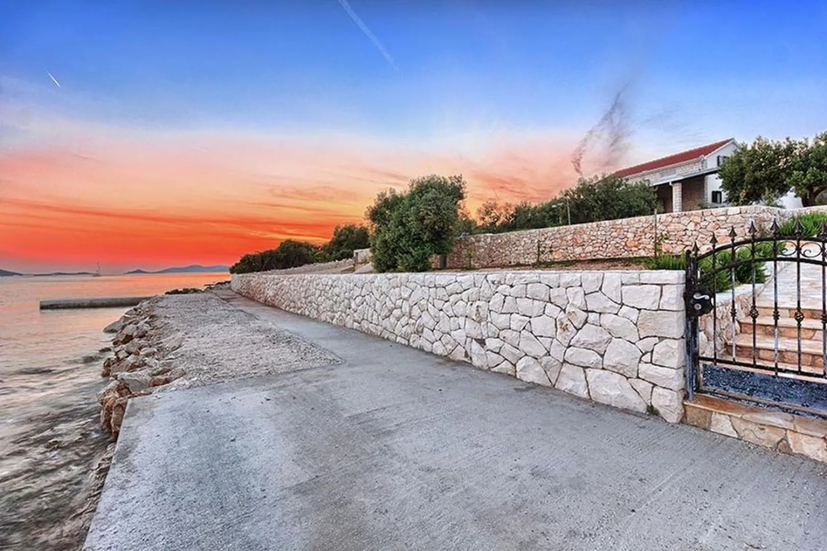 Property building in Luxury Beachfront Villa Dalmatino Trogir with private pool right at the beach in Okrug Gornji - Ciovo