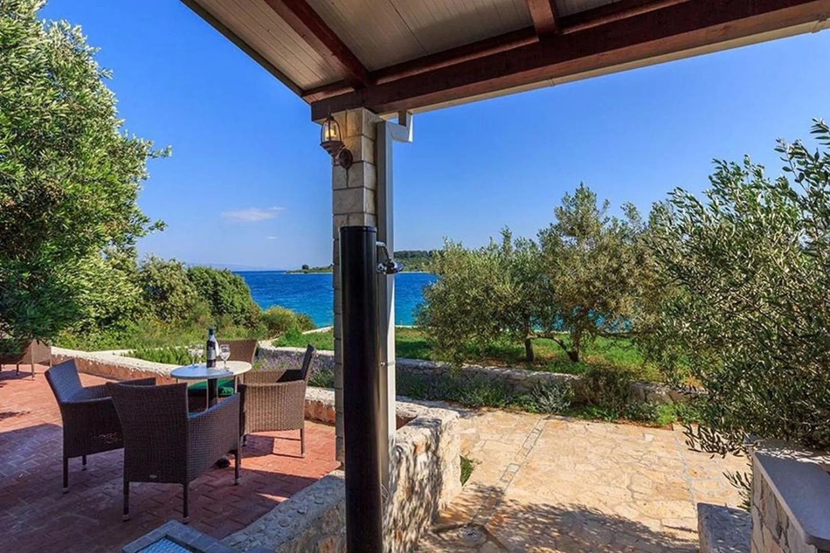 Patio in Luxury Beachfront Villa Dalmatino Trogir with private pool right at the beach in Okrug Gornji - Ciovo