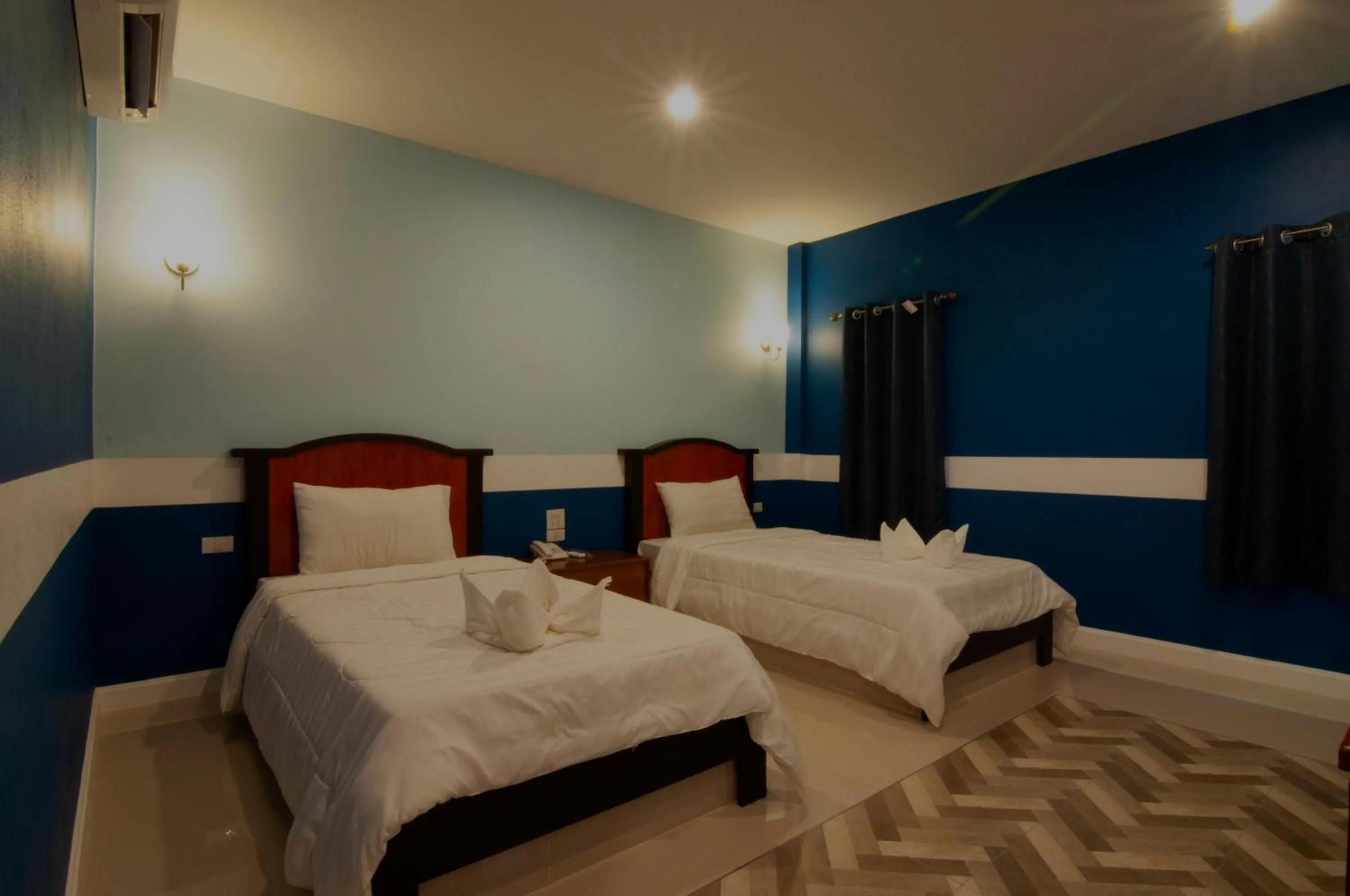 Bed in The Palm Resort Kampeang Saen