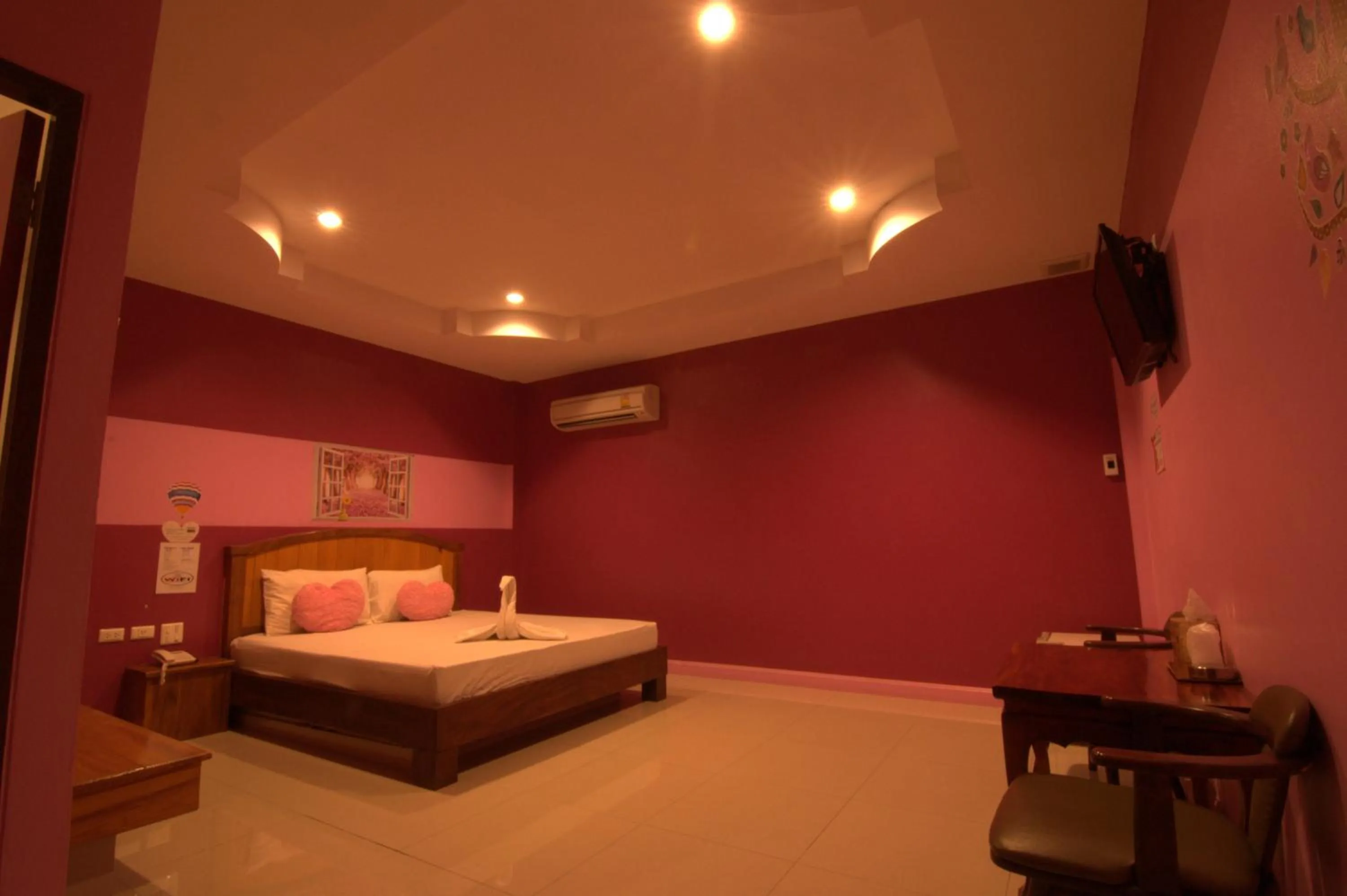 Bed in The Palm Resort Kampeang Saen