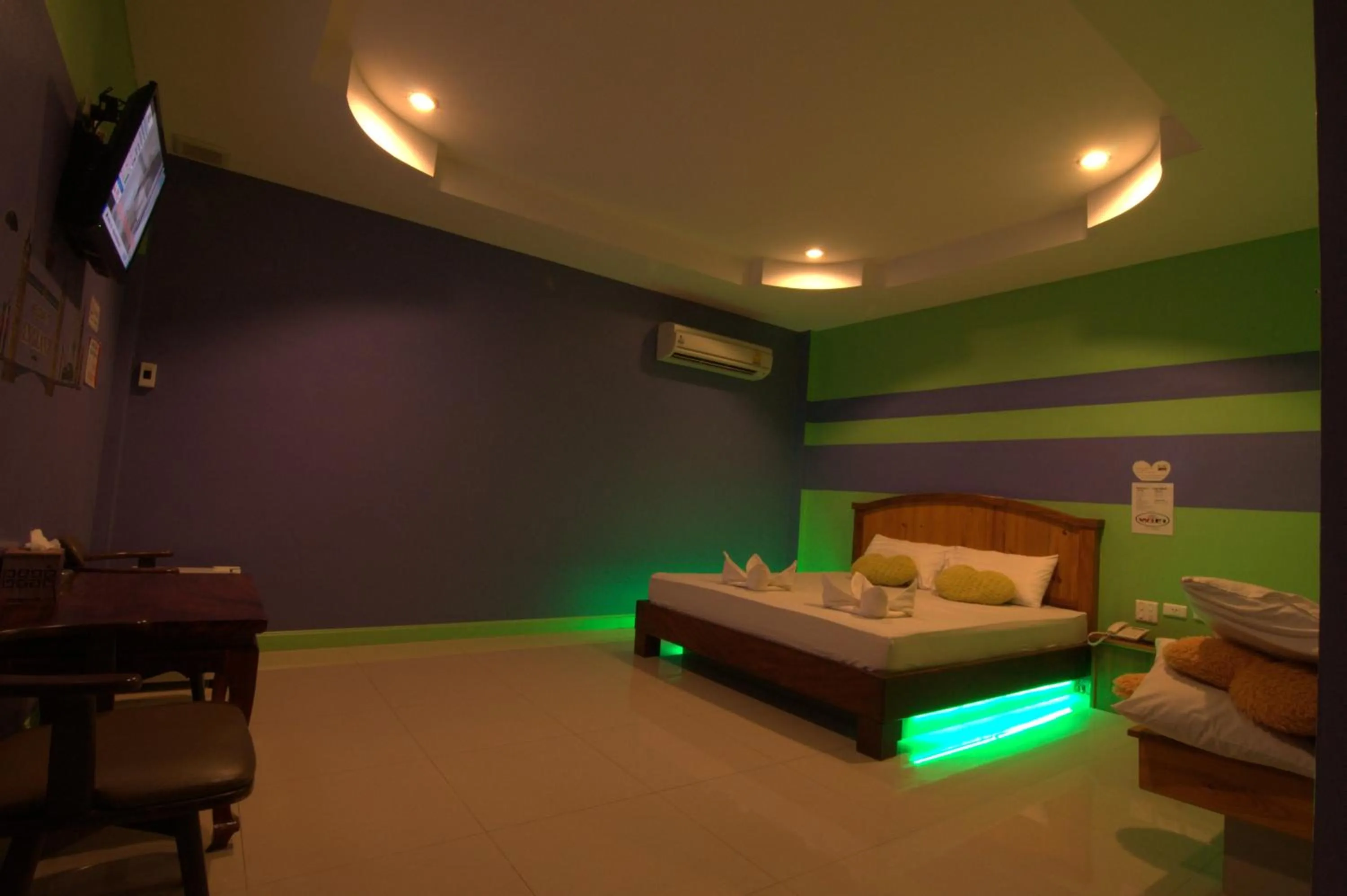 Bed in The Palm Resort Kampeang Saen