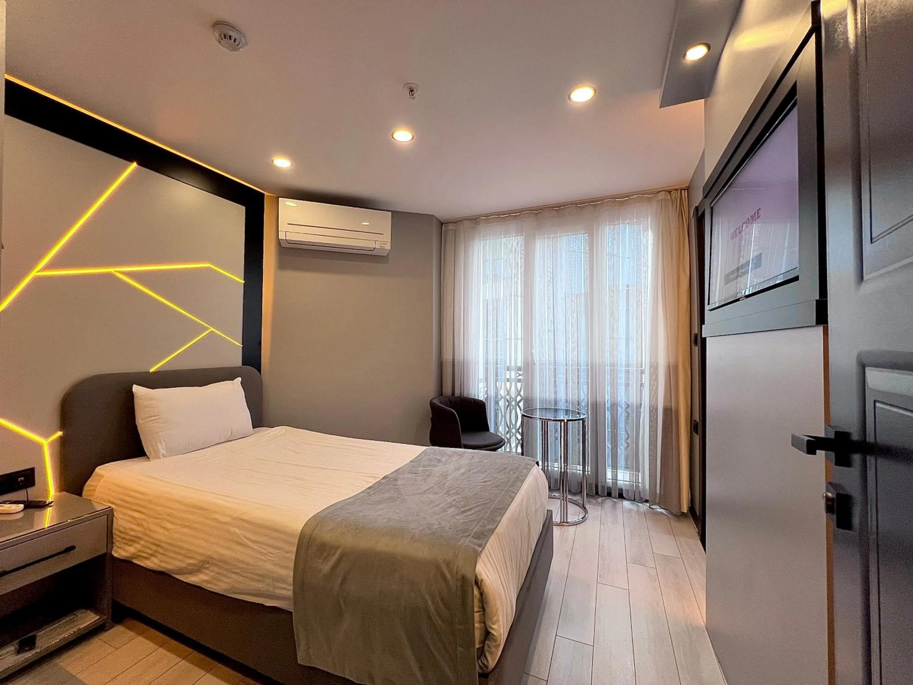 Bed in White Corner Hotel