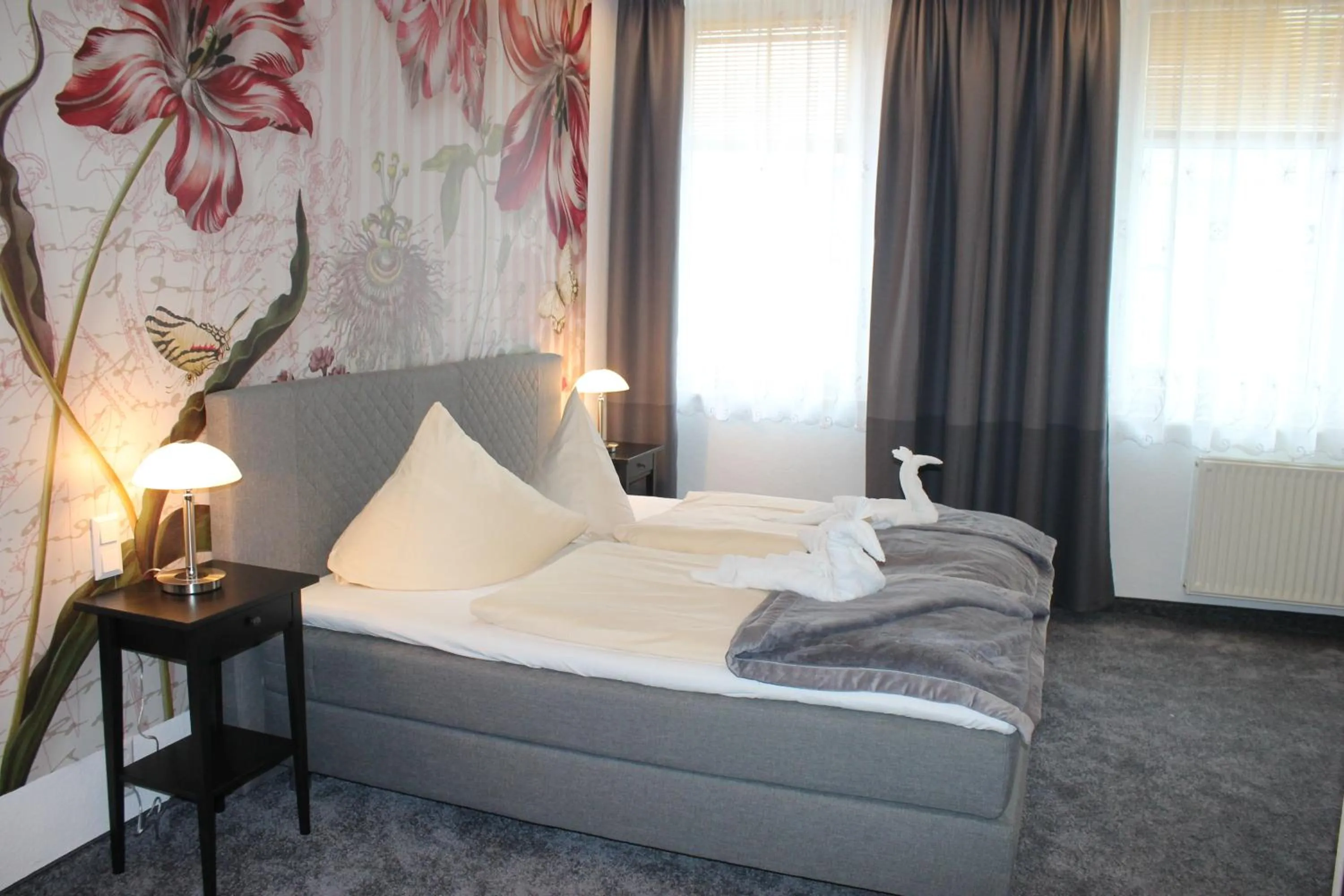 Photo of the whole room, Bed in Boulevardhotel Sängerstadt - alle Zimmer klimatisiert