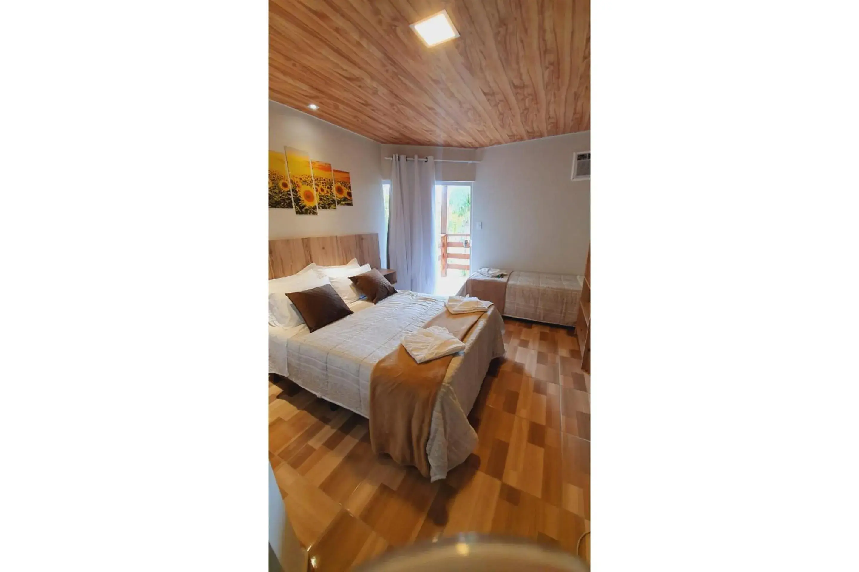 Superior Triple Room in OYO Pousada Coisa Mais Linda Superior Triple Room in OYO Pousada Coisa Mais Linda