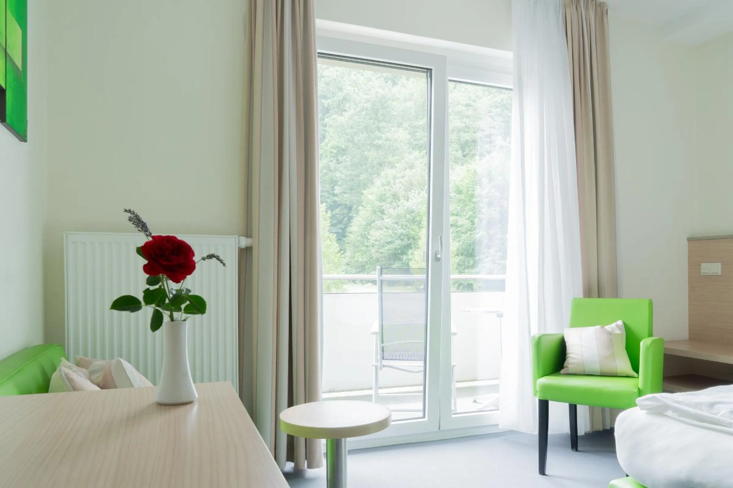 Garden view, Bed in aktiv Sporthotel Sächsische Schweiz