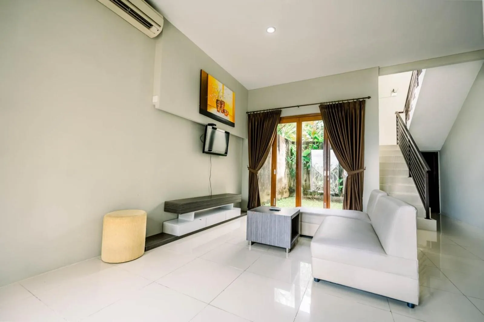 Communal lounge/ TV room, Bed in ABISHA Resort Jimbaran