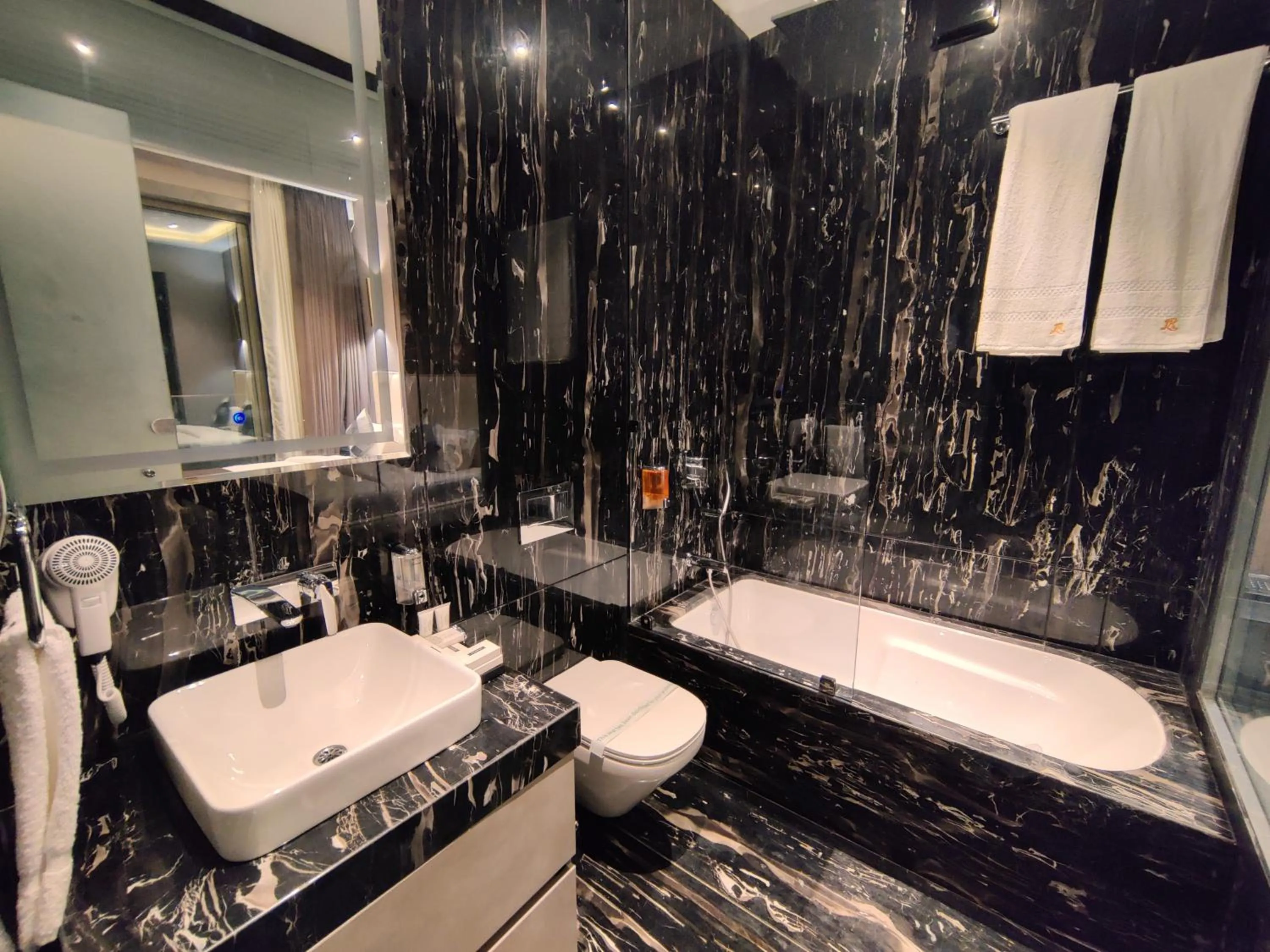 Bathroom in Valentia The Exotic Boutique Hotel - Pure Veg