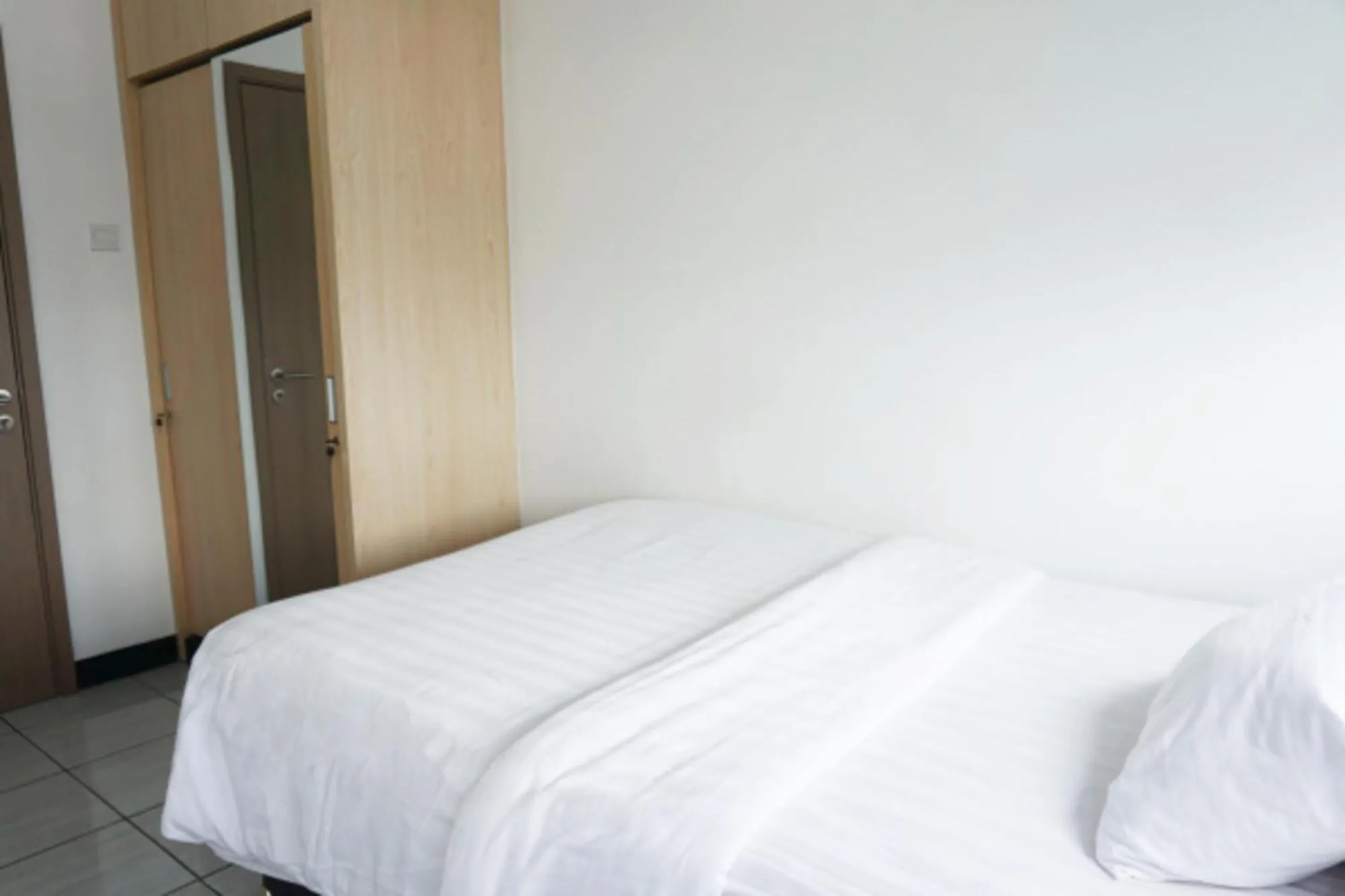 Bed in Cordova Suites