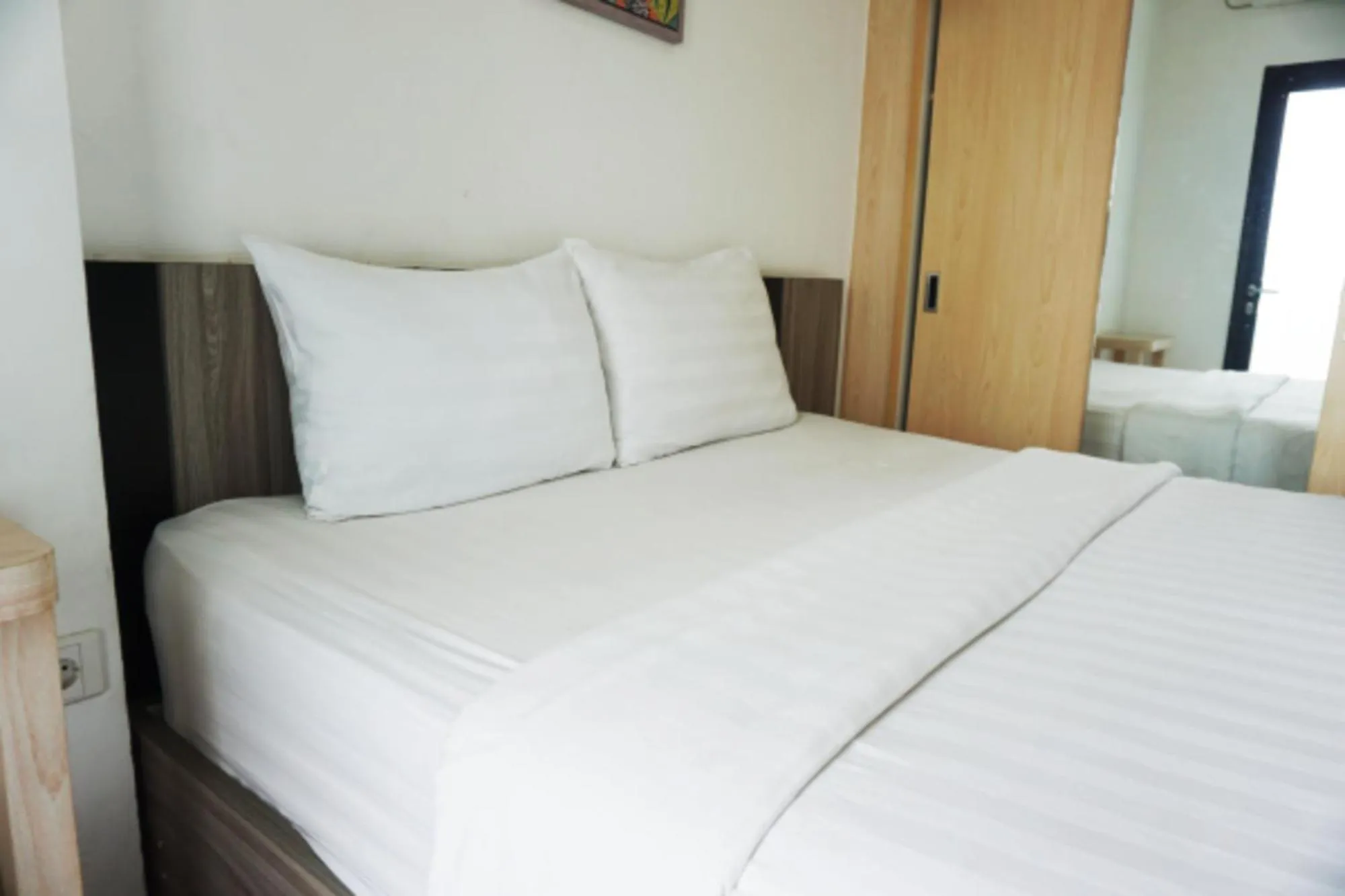 Bed in Cordova Suites