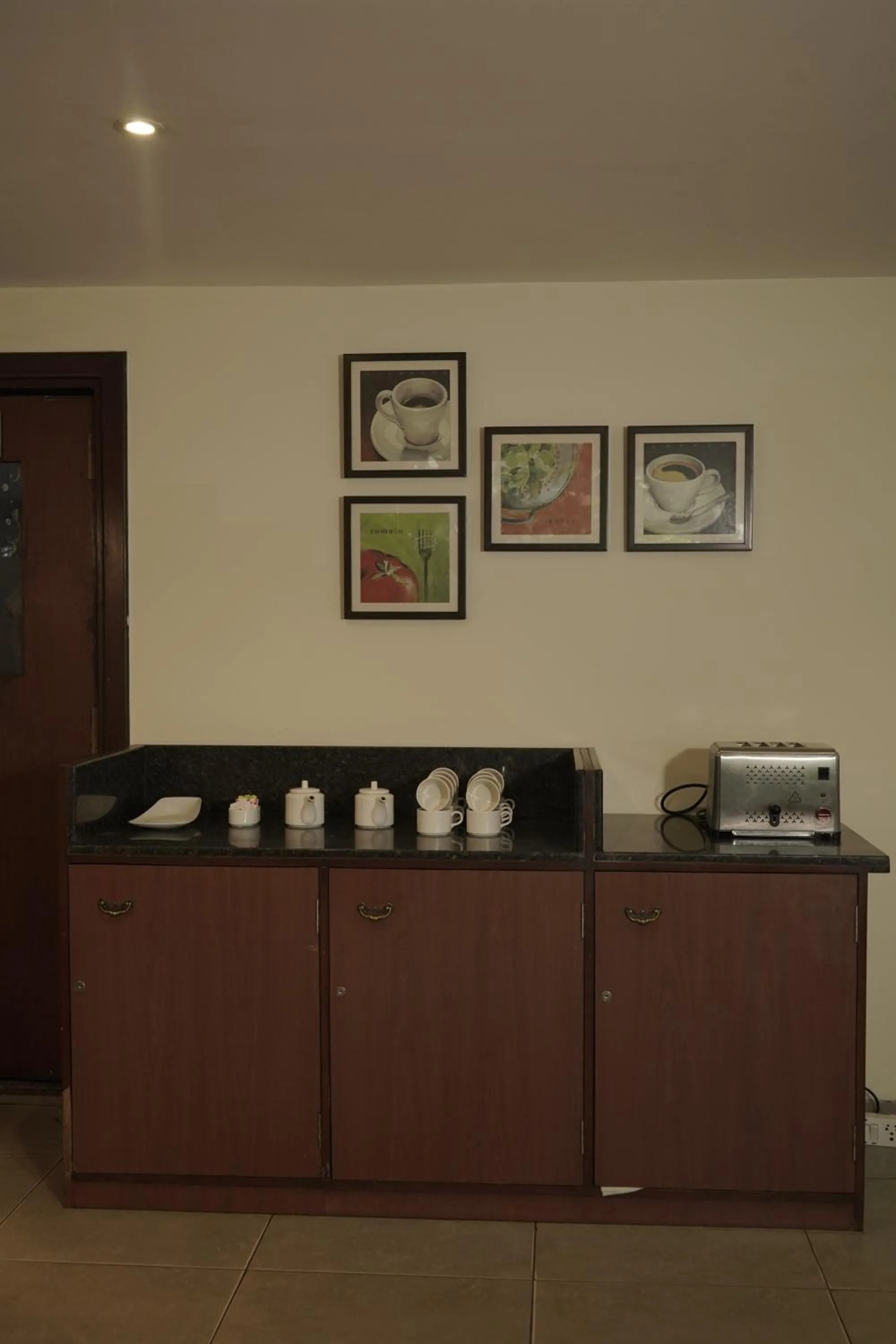 Kitchen or kitchenette in Trevon Hotels & Resorts Goa