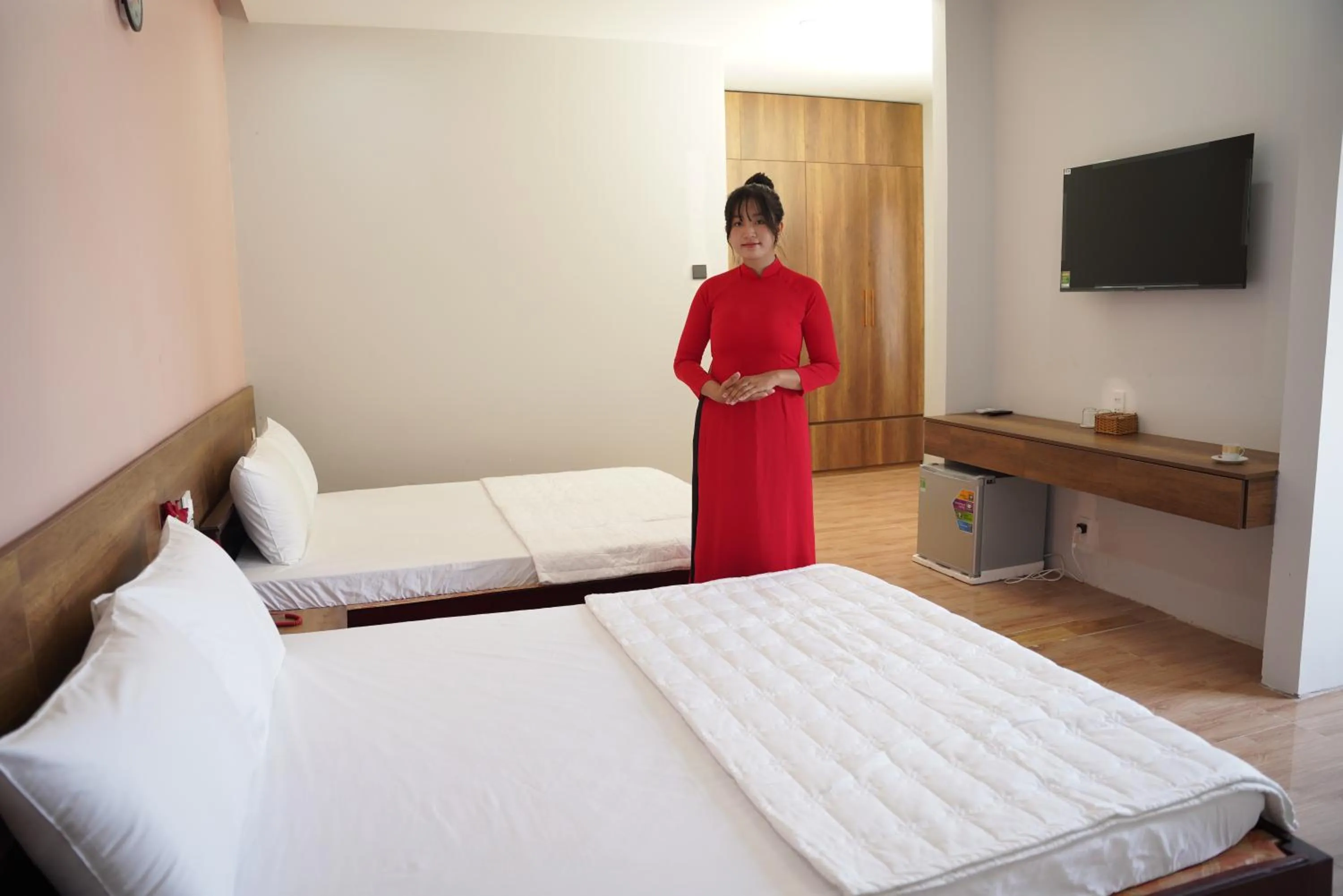 Bed in KHÁCH SẠN ĐẾ VƯƠNG
