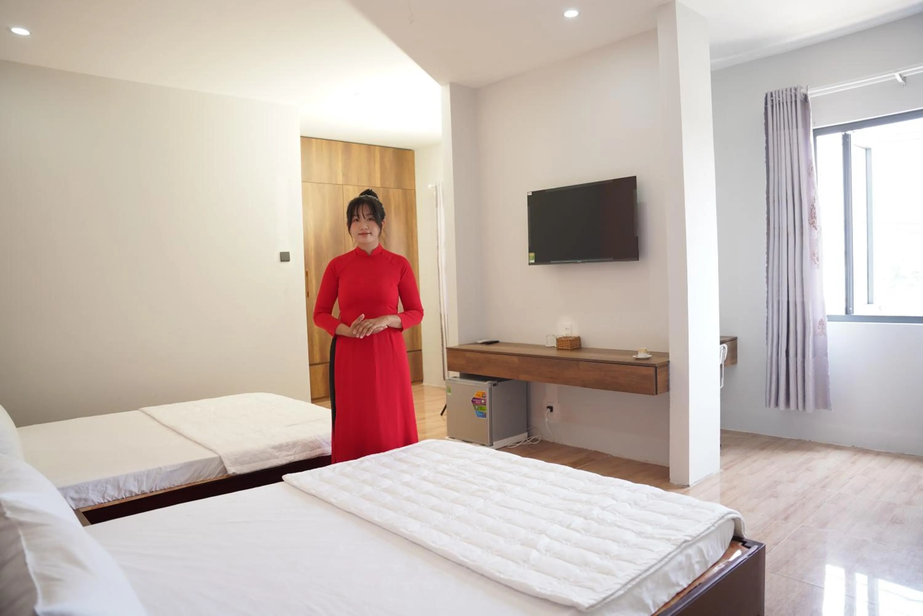 Bed in KHÁCH SẠN ĐẾ VƯƠNG