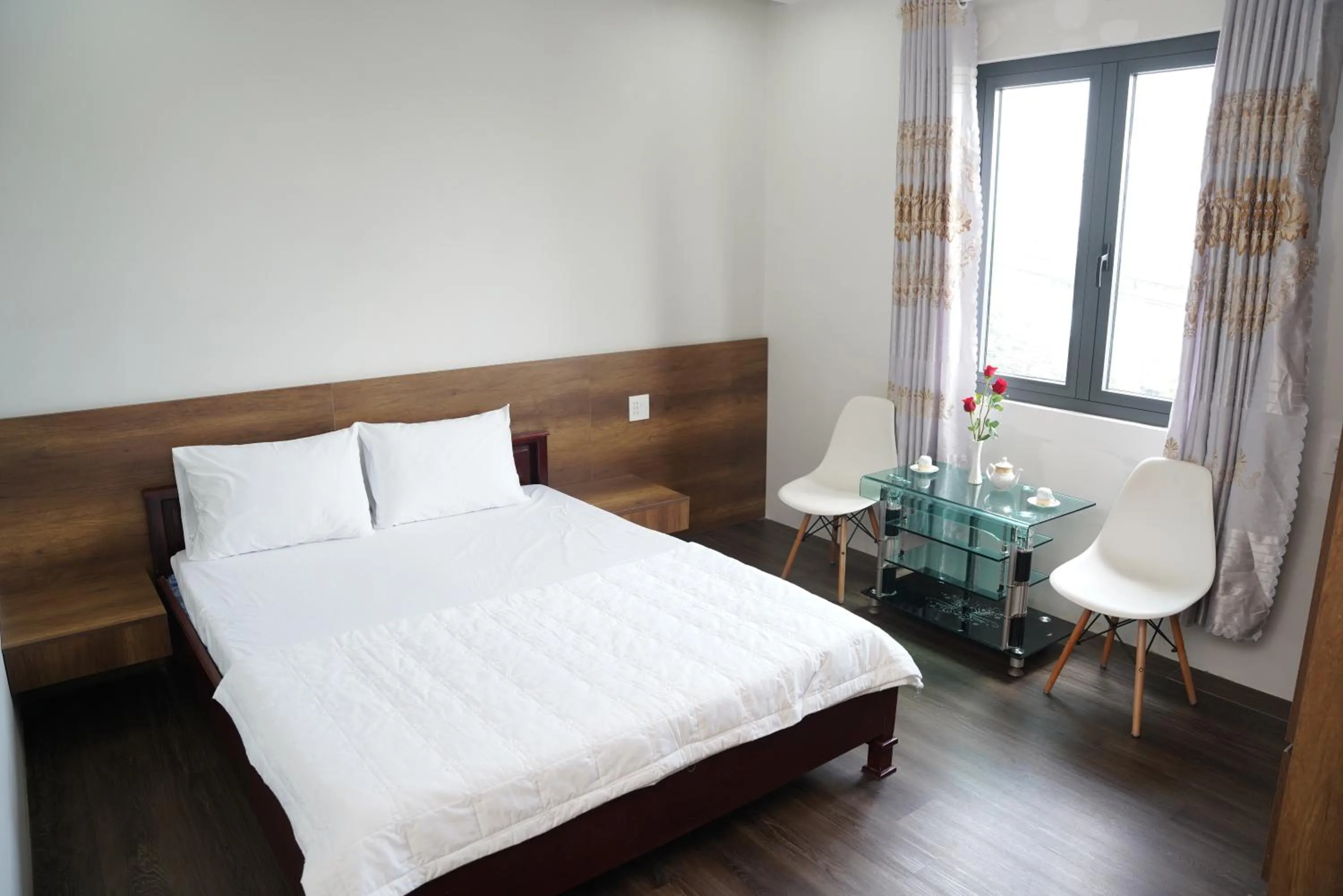 Bed in KHÁCH SẠN ĐẾ VƯƠNG