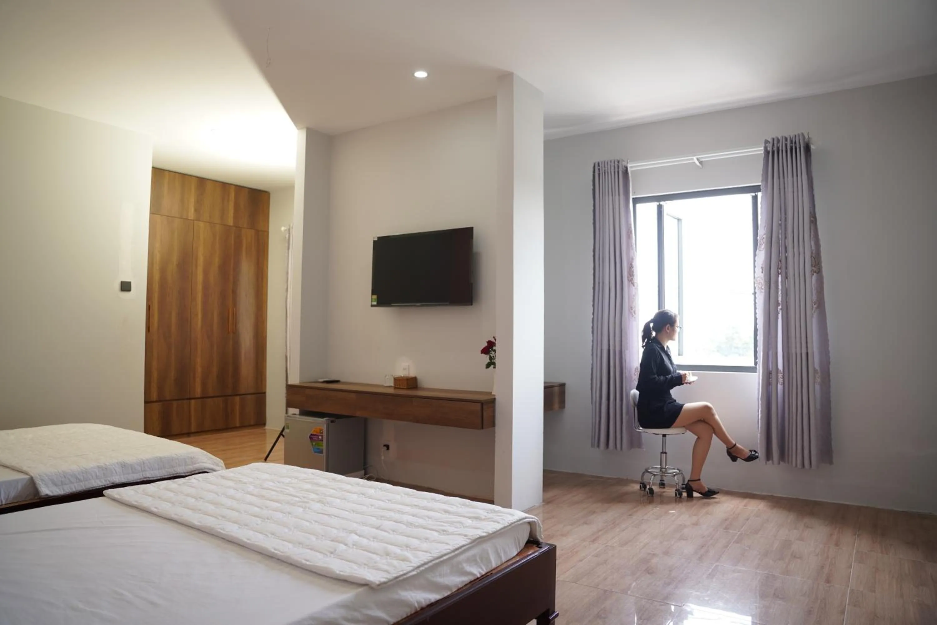 Bed in KHÁCH SẠN ĐẾ VƯƠNG